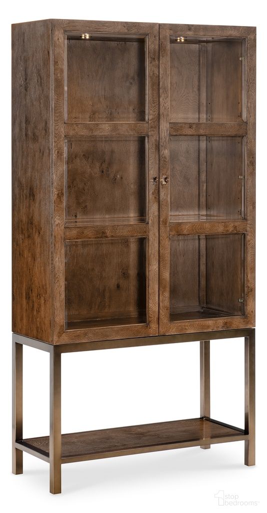 The appearance of Melange Mulholland Display Cabinet In Golden Brown designed by Hooker in the transitional interior design. This golden brown piece of furniture  was selected by 1StopBedrooms from Melange Collection to add a touch of cosiness and style into your home. Sku: 628-75018-82. Material: Solid Oak.