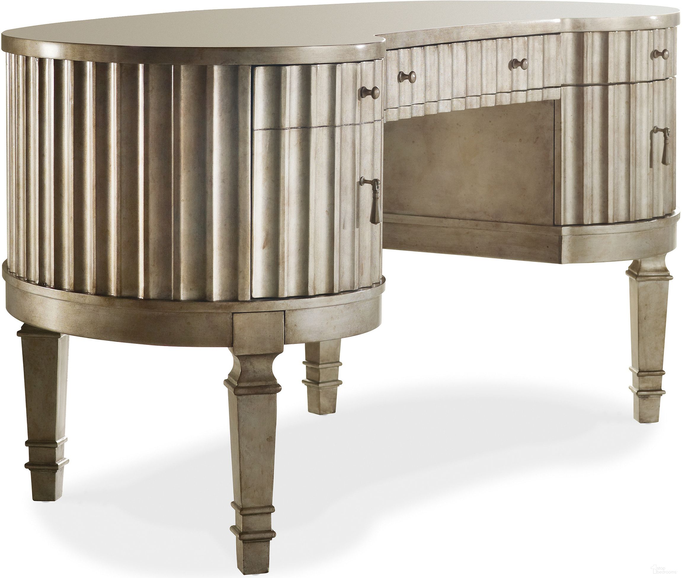 The appearance of Melange Silver Fluted Kidney Desk designed by Hooker in the transitional interior design. This silver piece of furniture  was selected by 1StopBedrooms from Melange Collection to add a touch of cosiness and style into your home. Sku: 638-10006. Material: Hardwood.