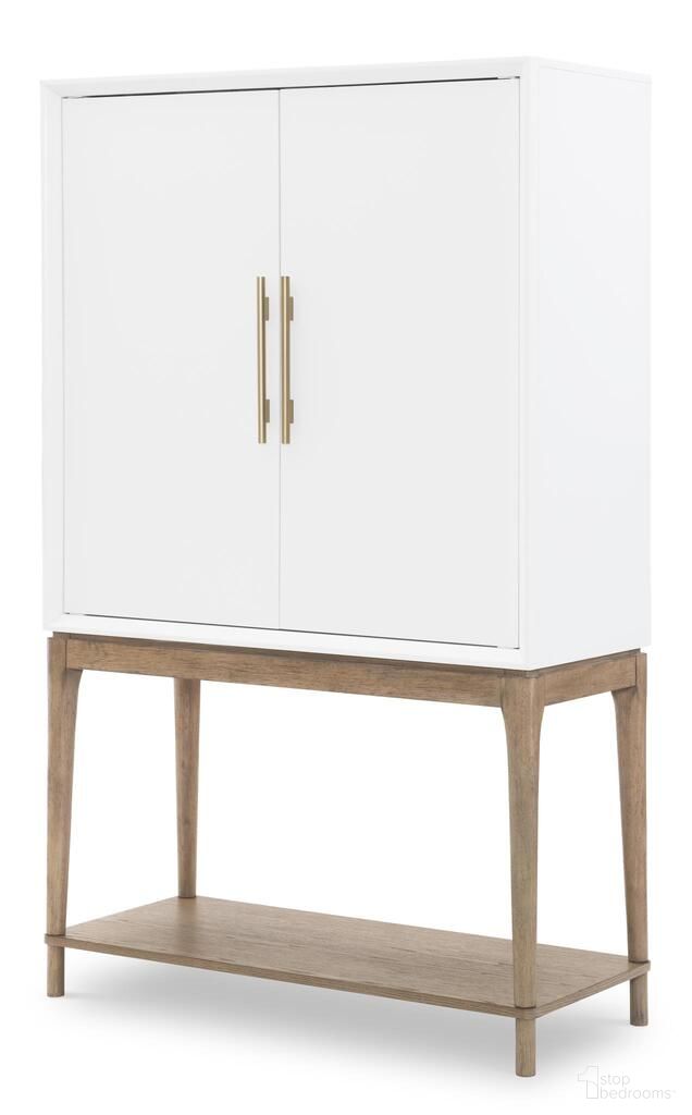 The appearance of Melrose Bar Console In Cloud White and Desert Oak designed by Legacy Classic in the modern / contemporary interior design. This cloud white and desert oak piece of furniture  was selected by 1StopBedrooms from Melrose Collection to add a touch of cosiness and style into your home. Sku: 4230-155. Material: MDF.