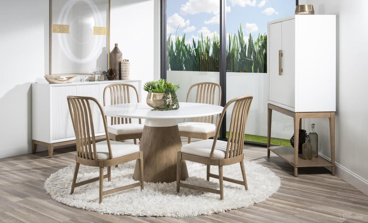 The appearance of Melrose Complete Round Dining Room Set In Cloud White and Desert Oak designed by Legacy Classic in the transitional interior design. This cloud white and desert oak piece of furniture  was selected by 1StopBedrooms from Melrose Collection to add a touch of cosiness and style into your home. Sku: 4230-520T;4230-520B;4230-140. Table Top Shape: Round. Material: MDF. Size: 54".