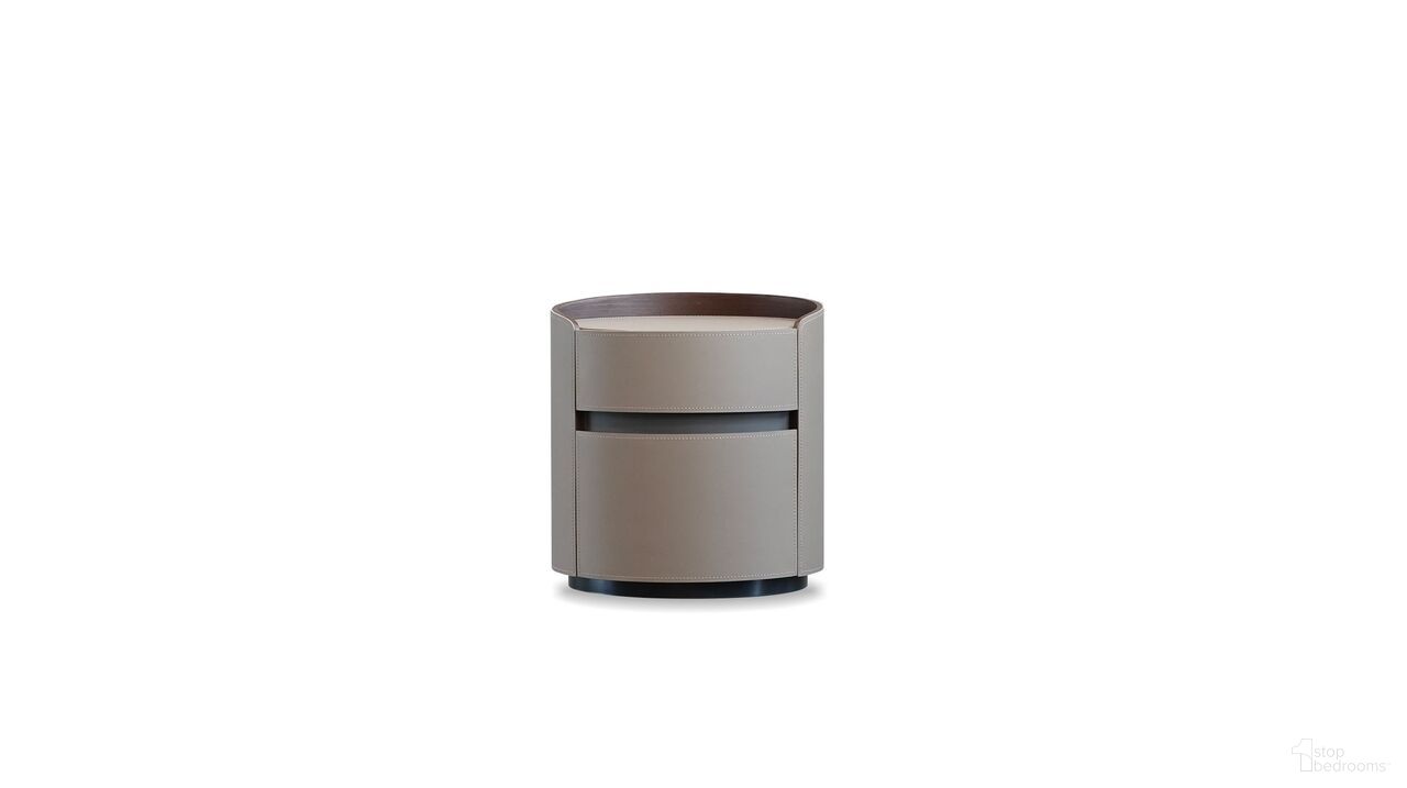 The appearance of Merc Round Side Table In Sand designed by Mobital in the modern / contemporary interior design. This sand piece of furniture  was selected by 1StopBedrooms from Merc Collection to add a touch of cosiness and style into your home. Sku: NIG-MERC-SAND-LEAT. Material: Leather.