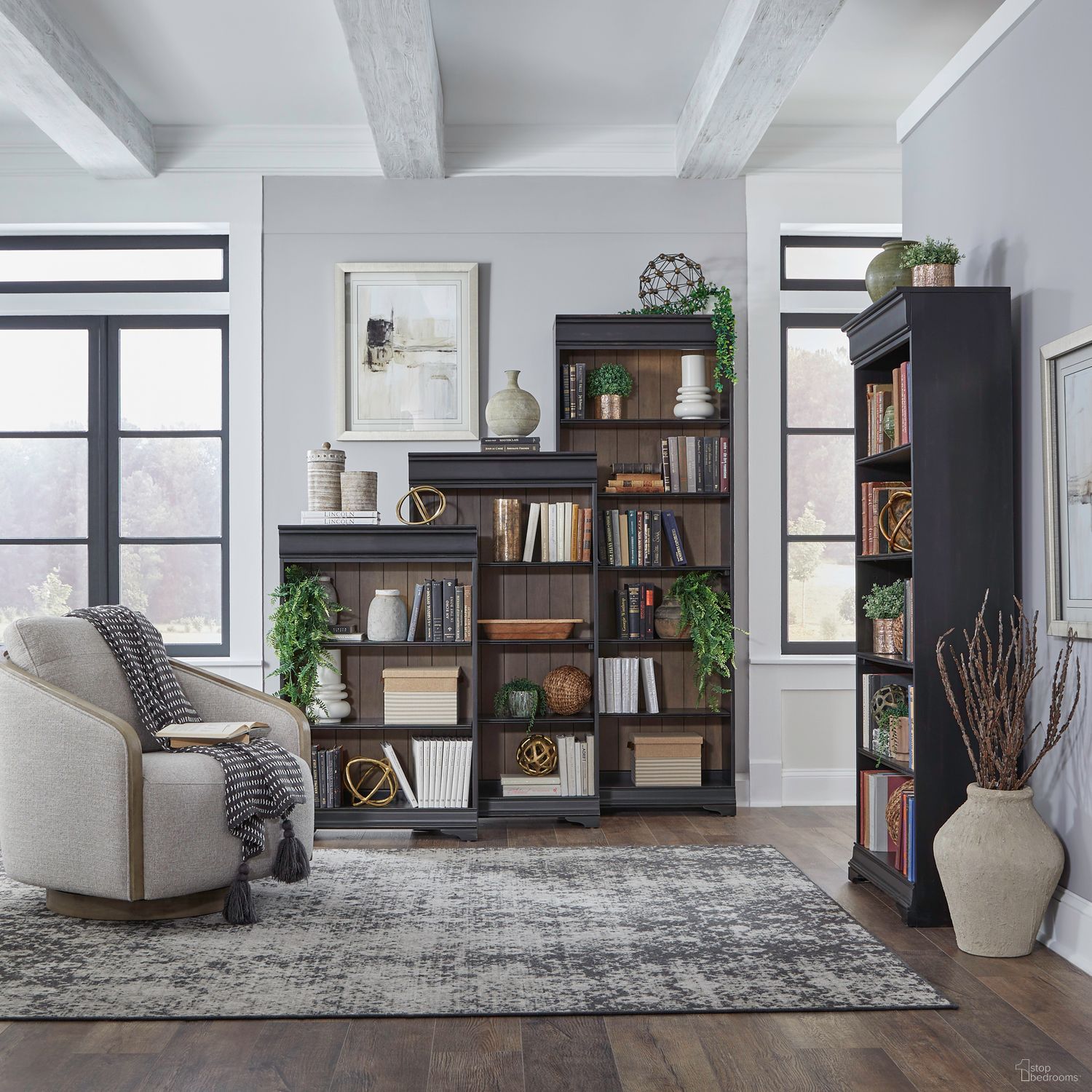 The appearance of Meritage Stepped Bookcase Wall In Aged Charcoal and Caramel designed by Liberty in the traditional interior design. This aged charcoal/caramel piece of furniture was selected by 1StopBedrooms from Meritage Collection to add a touch of cosiness and style into your home. Sku: 532-HO3048;532-HO3060;532-HO3072;532-HO3084. Material: Poplar Solid.