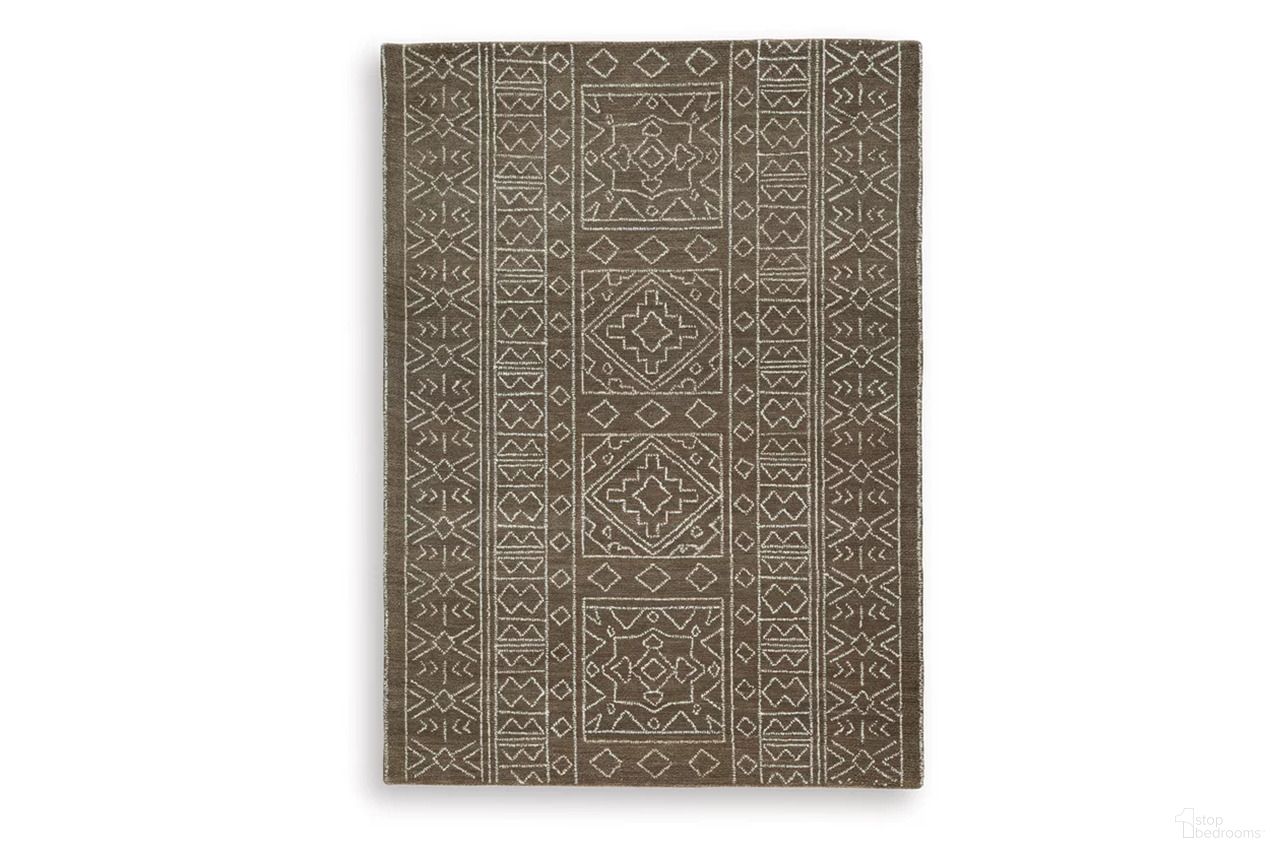 The appearance of Merrittman 5' x 7' Area Rug In Brown and Ivory designed by Signature Design by Ashley in the transitional interior design. This brown/ivory piece of furniture was selected by 1StopBedrooms from Merrittman Collection to add a touch of cosiness and style into your home. Sku: R407702.