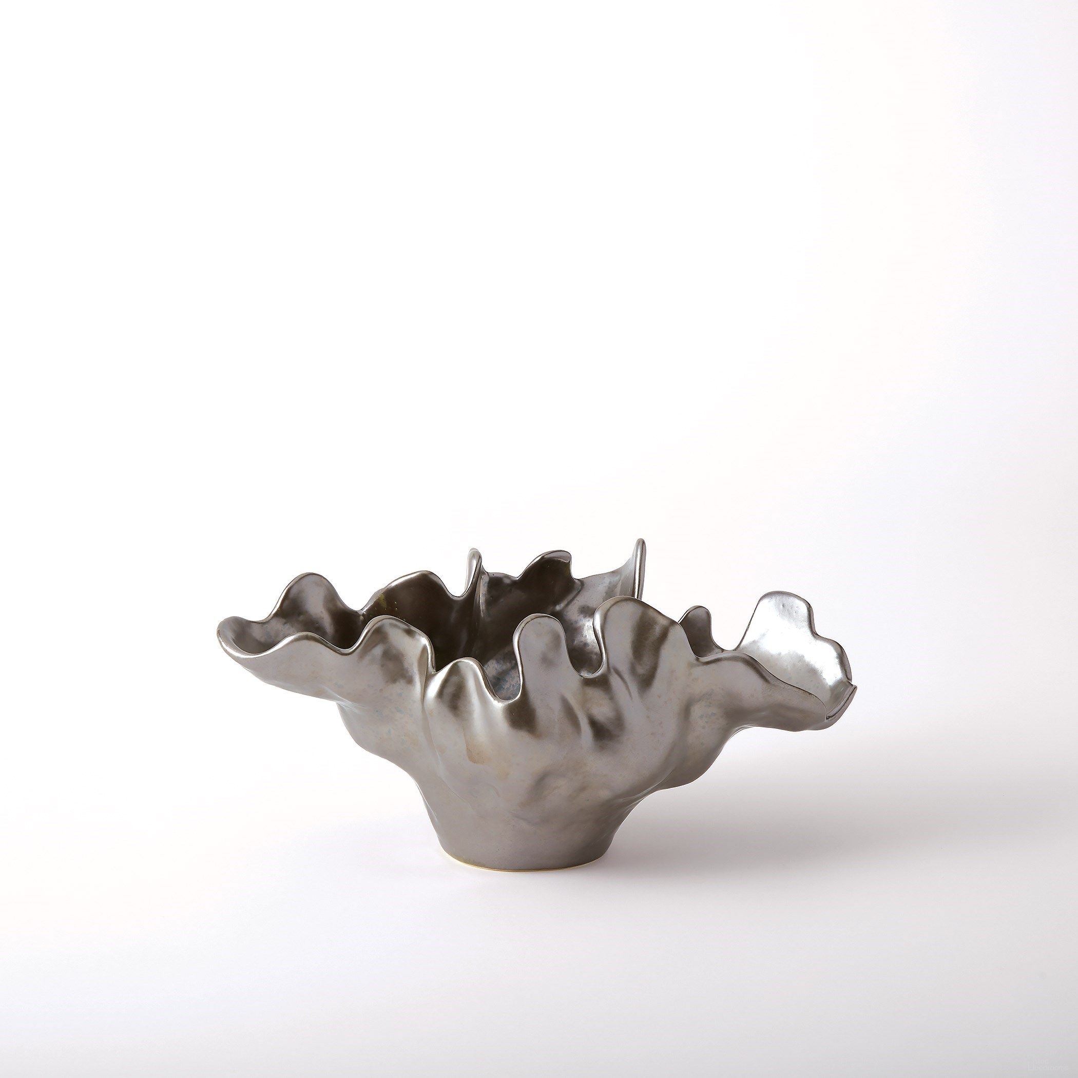 The appearance of Meteor Small Bowl In Silver Haze designed by Global Views in the modern / contemporary interior design. This silver piece of furniture  was selected by 1StopBedrooms from Meteor Collection to add a touch of cosiness and style into your home. Sku: 110166. Material: Ceramic.