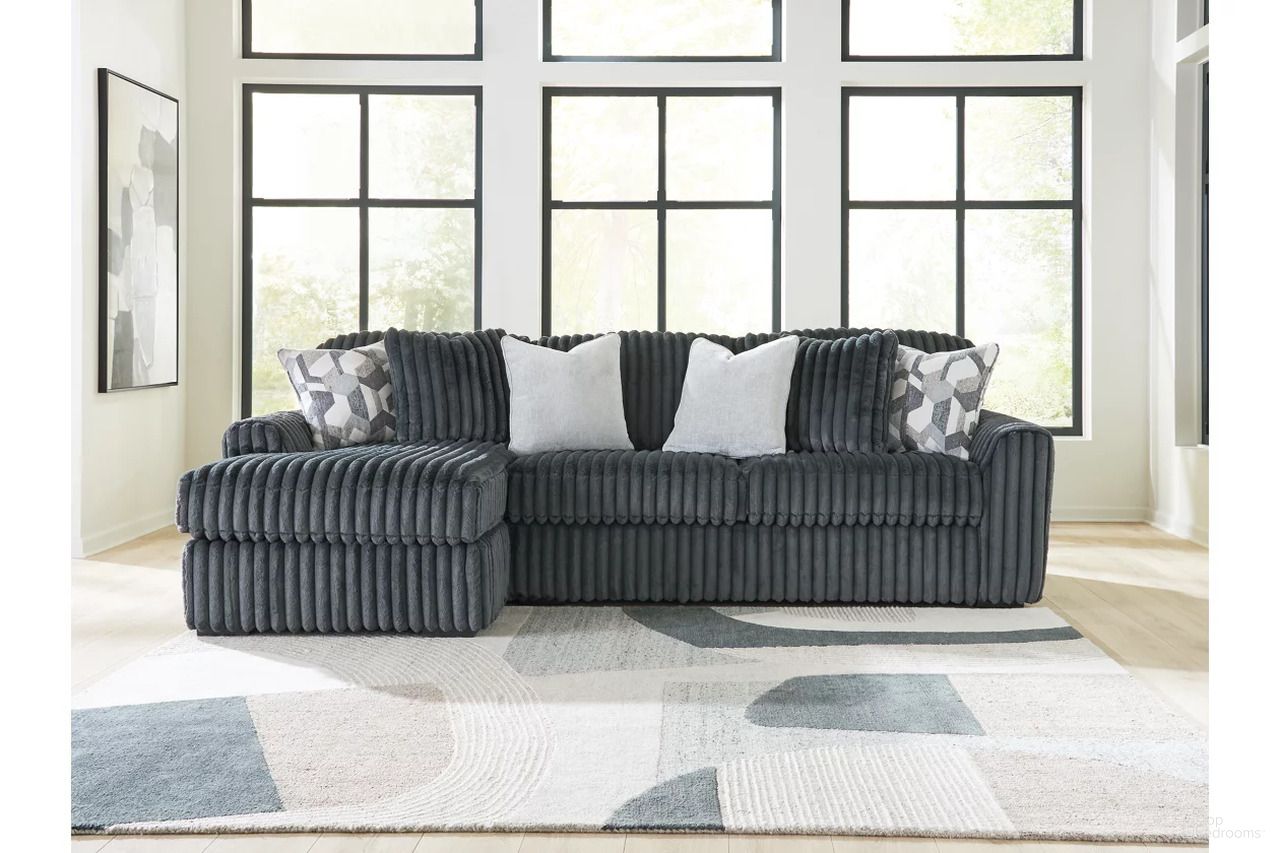 The appearance of Midnight-Madness 2-Piece Sectional RAF Sofa Chaise In Gunmetal designed by Signature Design by Ashley in the modern / contemporary interior design. This gunmetal piece of furniture was selected by 1StopBedrooms from Midnight-Madness Collection to add a touch of cosiness and style into your home. Sku: 9810516;9810567. Material: Polyester. Layout: Sofa & Chaise.