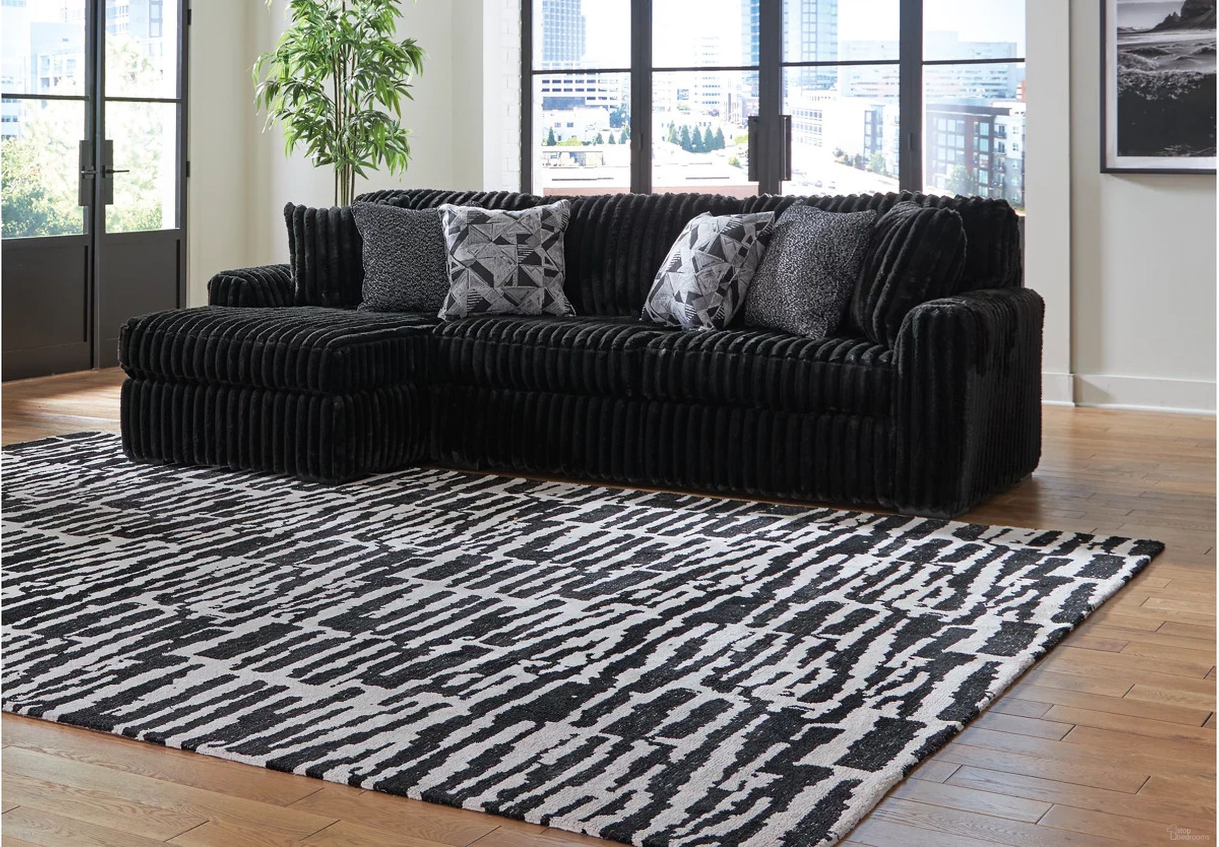 The appearance of Midnight-Madness 2-Piece Sectional Sofa With LAF Chaise In Onyx designed by Signature Design by Ashley in the modern / contemporary interior design. This onyx piece of furniture was selected by 1StopBedrooms from Midnight-Madness Collection to add a touch of cosiness and style into your home. Sku: 9810316;9810367. Material: Polyester. Layout: L-Shape. Orientation: LAF.