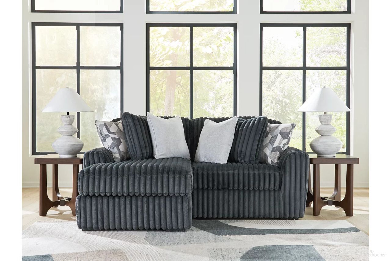 The appearance of Midnight-Madness 2-Piece Sectional with LAF Chaise In Gunmetal designed by Signature Design by Ashley in the modern / contemporary interior design. This gunmetal piece of furniture was selected by 1StopBedrooms from Midnight-Madness Collection to add a touch of cosiness and style into your home. Sku: 9810516;9810565. Material: Polyester. Layout: LAF.