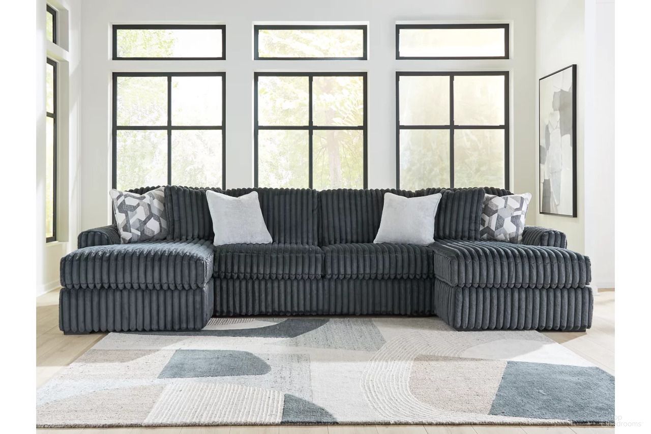 The appearance of Midnight-Madness 3-Piece LAF Double Chaise Sectional In Gunmetal designed by Signature Design by Ashley in the modern / contemporary interior design. This gunmetal piece of furniture was selected by 1StopBedrooms from Midnight-Madness Collection to add a touch of cosiness and style into your home. Sku: 9810516;9810534;9810517. Material: Polyester. Layout: U-Shape.