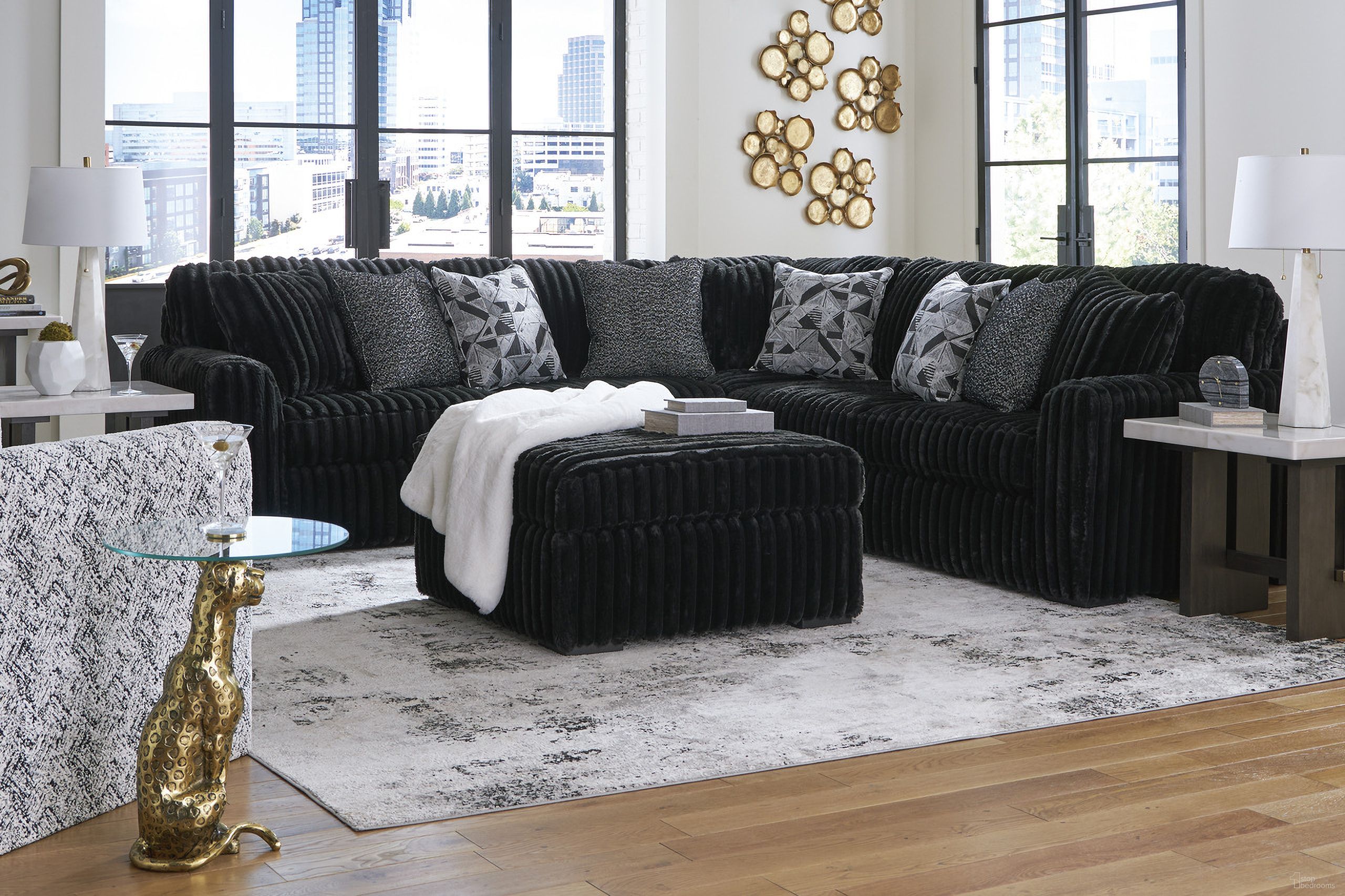 The appearance of Midnight-Madness 3-Piece Sectional and Oversized Ottoman In Onyx designed by Signature Design by Ashley in the modern / contemporary interior design. This onyx piece of furniture was selected by 1StopBedrooms from Midnight-Madness Collection to add a touch of cosiness and style into your home. Sku: 9810366;9810377;9810308;9810367. Layout: L-Shape. Material: Corduroy.
