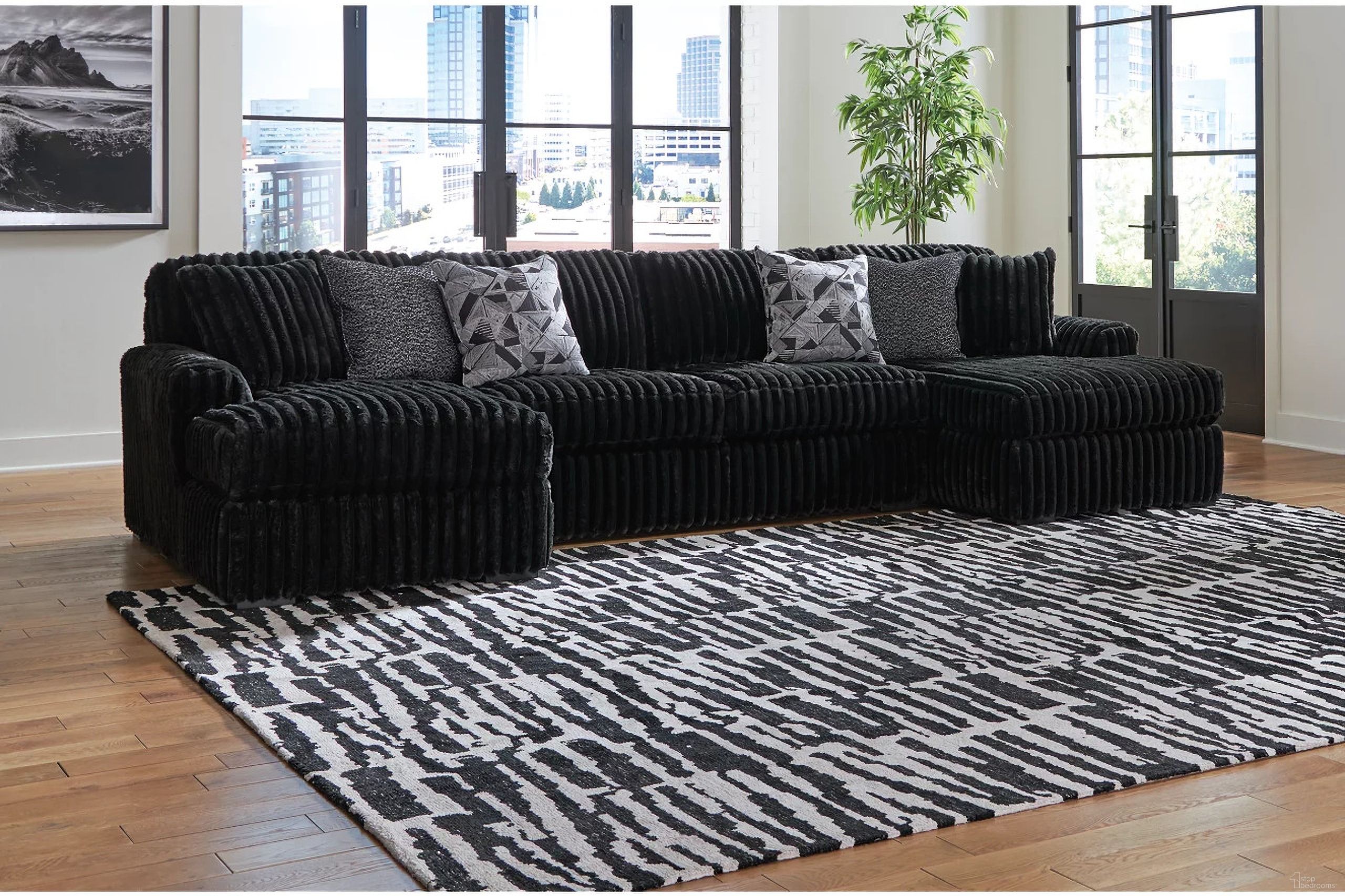 The appearance of Midnight-Madness 3-Piece Sectional With Chaise In Onyx designed by Signature Design by Ashley in the modern / contemporary interior design. This onyx piece of furniture was selected by 1StopBedrooms from Midnight-Madness Collection to add a touch of cosiness and style into your home. Sku: 9810316;9810334;9810317. Material: Polyester. Layout: U-Shape.