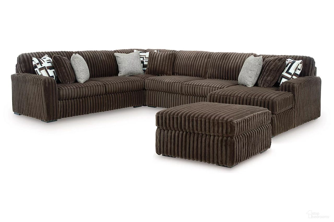 The appearance of Midnight-Madness 4-Piece Sectional and Oversized Accent Ottoman In Chocolate designed by Signature Design by Ashley in the modern / contemporary interior design. This chocolate piece of furniture was selected by 1StopBedrooms from Midnight-Madness Collection to add a touch of cosiness and style into your home. Sku: 9810466;9810408;9810434;9810477;9810417. Material: Corduroy.