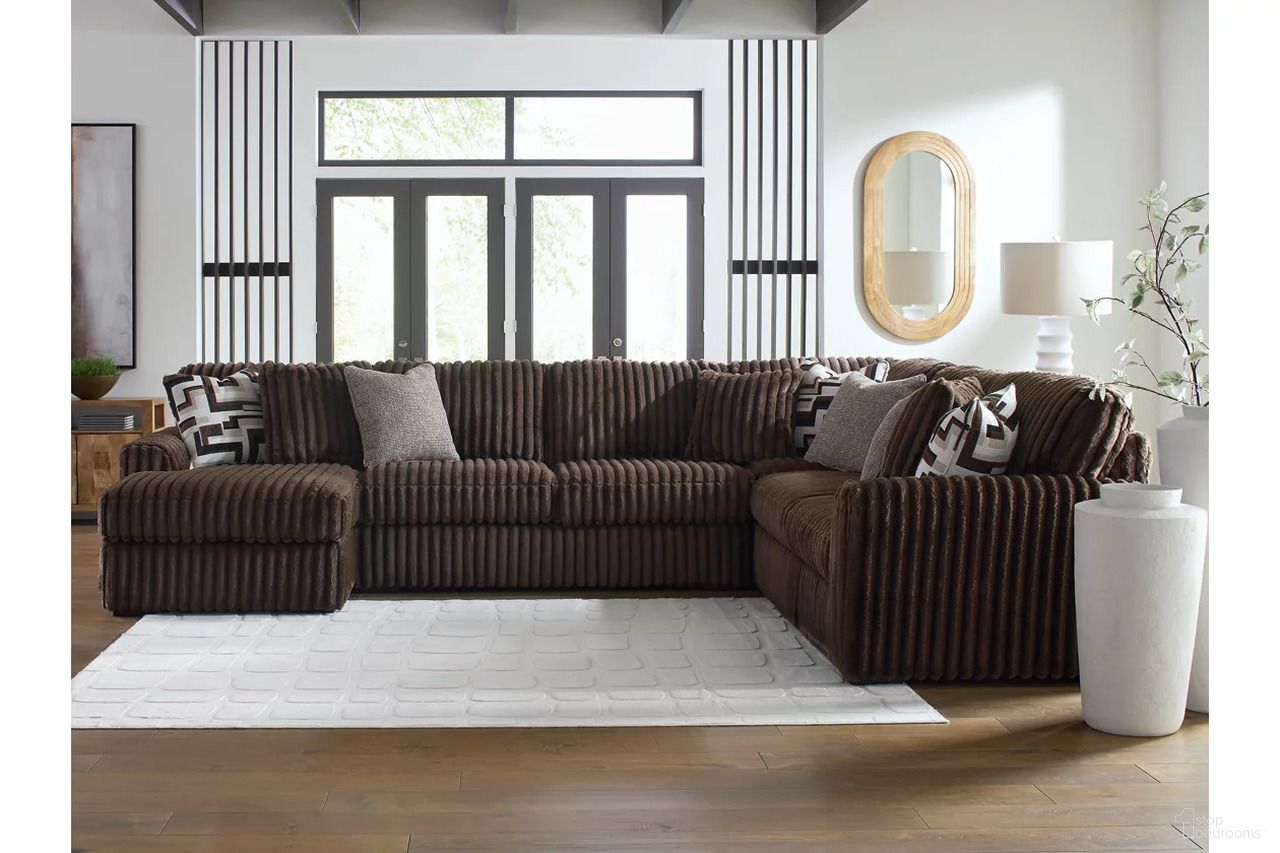 The appearance of Midnight-Madness 4-Piece Sectional with LAF Corner Chaise In Chocolate designed by Signature Design by Ashley in the modern / contemporary interior design. This chocolate piece of furniture was selected by 1StopBedrooms from Midnight-Madness Collection to add a touch of cosiness and style into your home. Sku: 9810416;9810434;9810477;9810467. Material: Polyester. Layout: Sofa & Chaise.
