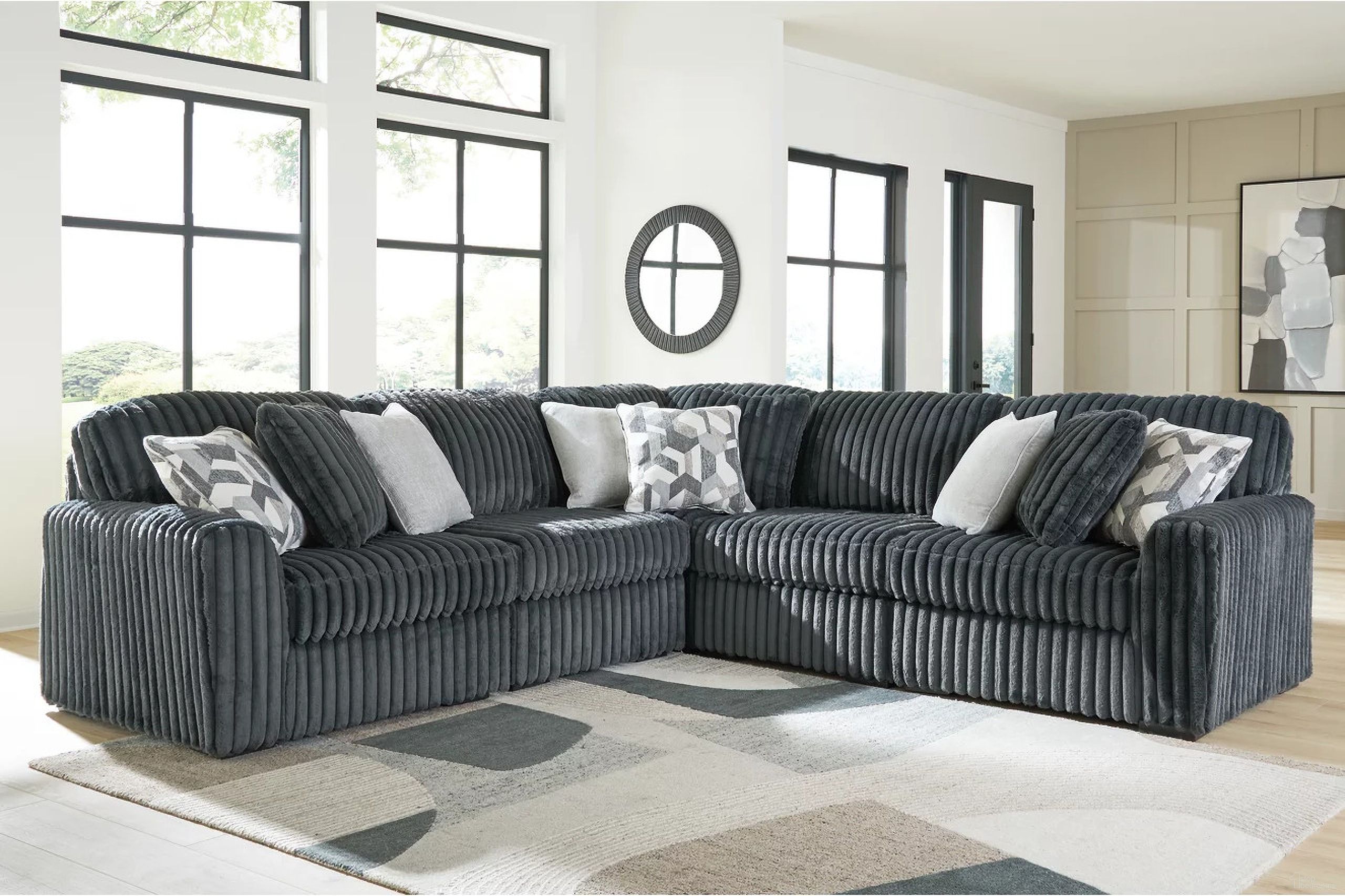 The appearance of Midnight-Madness 5-Piece Sectional In Gunmetal designed by Signature Design by Ashley in the modern / contemporary interior design. This gunmetal piece of furniture was selected by 1StopBedrooms from Midnight-Madness Collection to add a touch of cosiness and style into your home. Sku: 9810564;9810546;9810546;9810577;9810565. Material: Polyester. Layout: L-Shape.