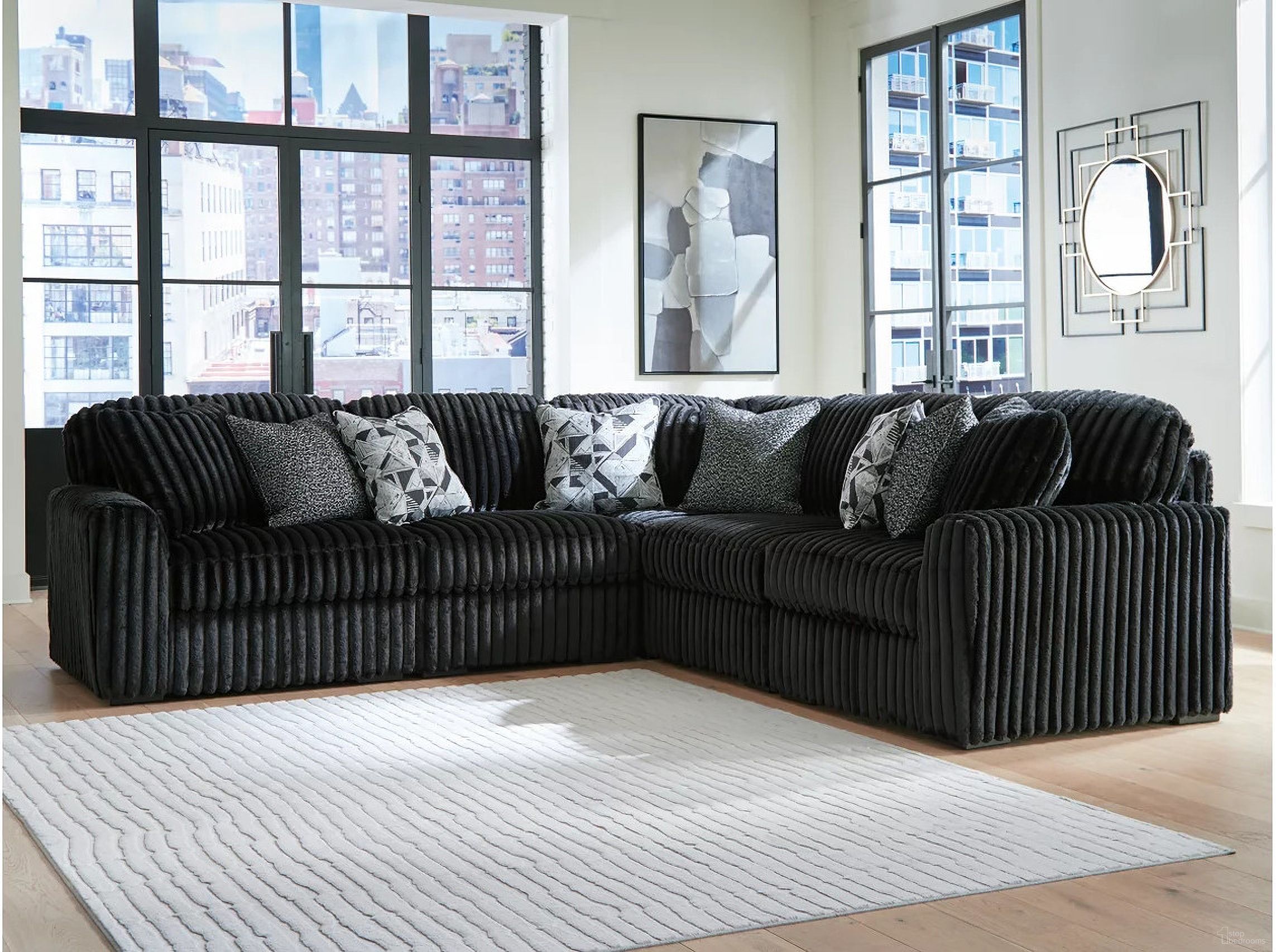 The appearance of Midnight-Madness 5-Piece Sectional In Onyx designed by Signature Design by Ashley in the modern / contemporary interior design. This onyx piece of furniture was selected by 1StopBedrooms from Midnight-Madness Collection to add a touch of cosiness and style into your home. Sku: 9810346;9810346;9810364;9810365;9810377. Material: Polyester. Layout: L-Shape.