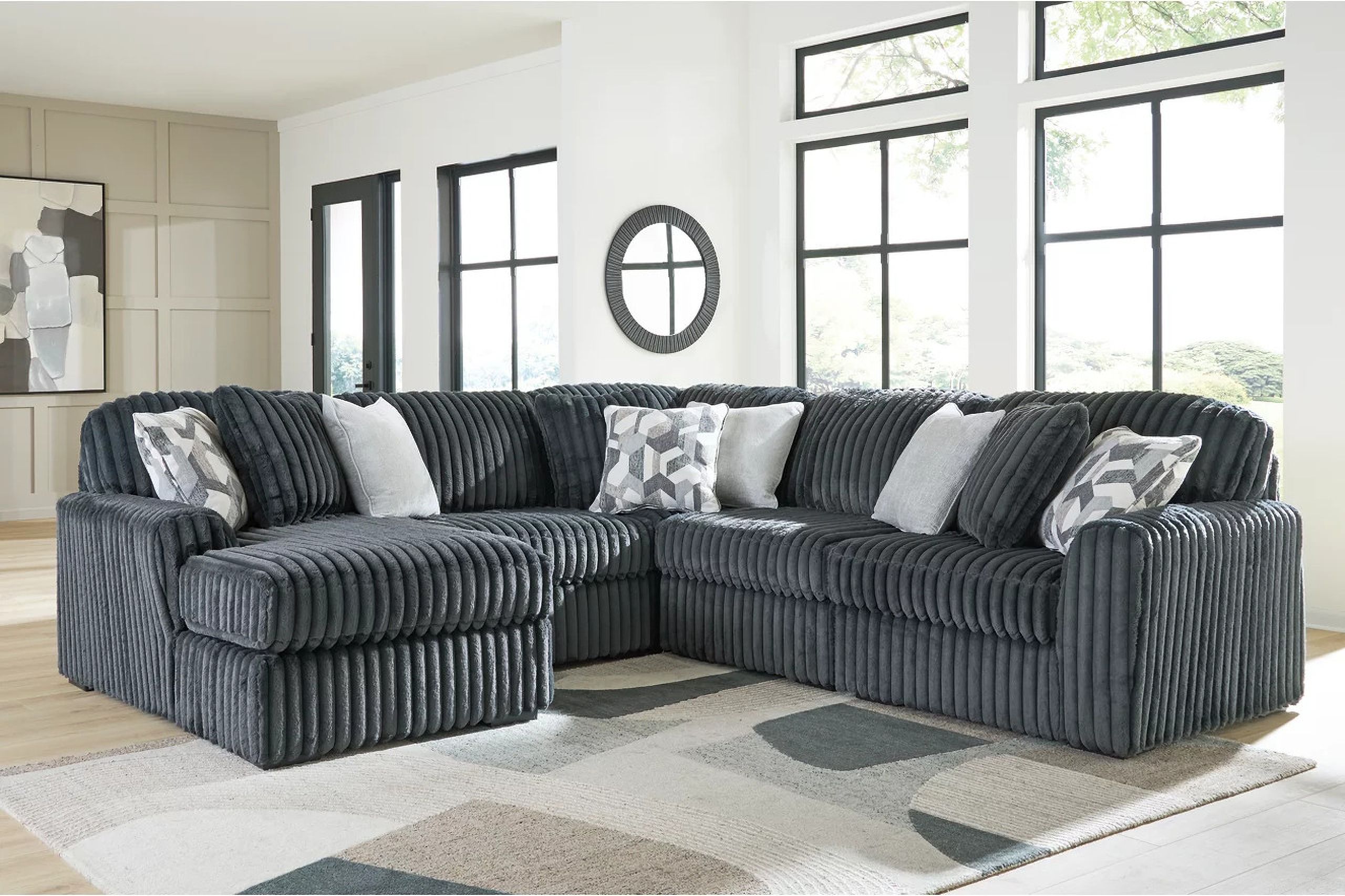 The appearance of Midnight-Madness 5-Piece Sectional with LAF Chaise In Gunmetal designed by Signature Design by Ashley in the modern / contemporary interior design. This gunmetal piece of furniture was selected by 1StopBedrooms from Midnight-Madness Collection to add a touch of cosiness and style into your home. Sku: 9810516;9810546;9810546;9810577;9810565. Material: Polyester.