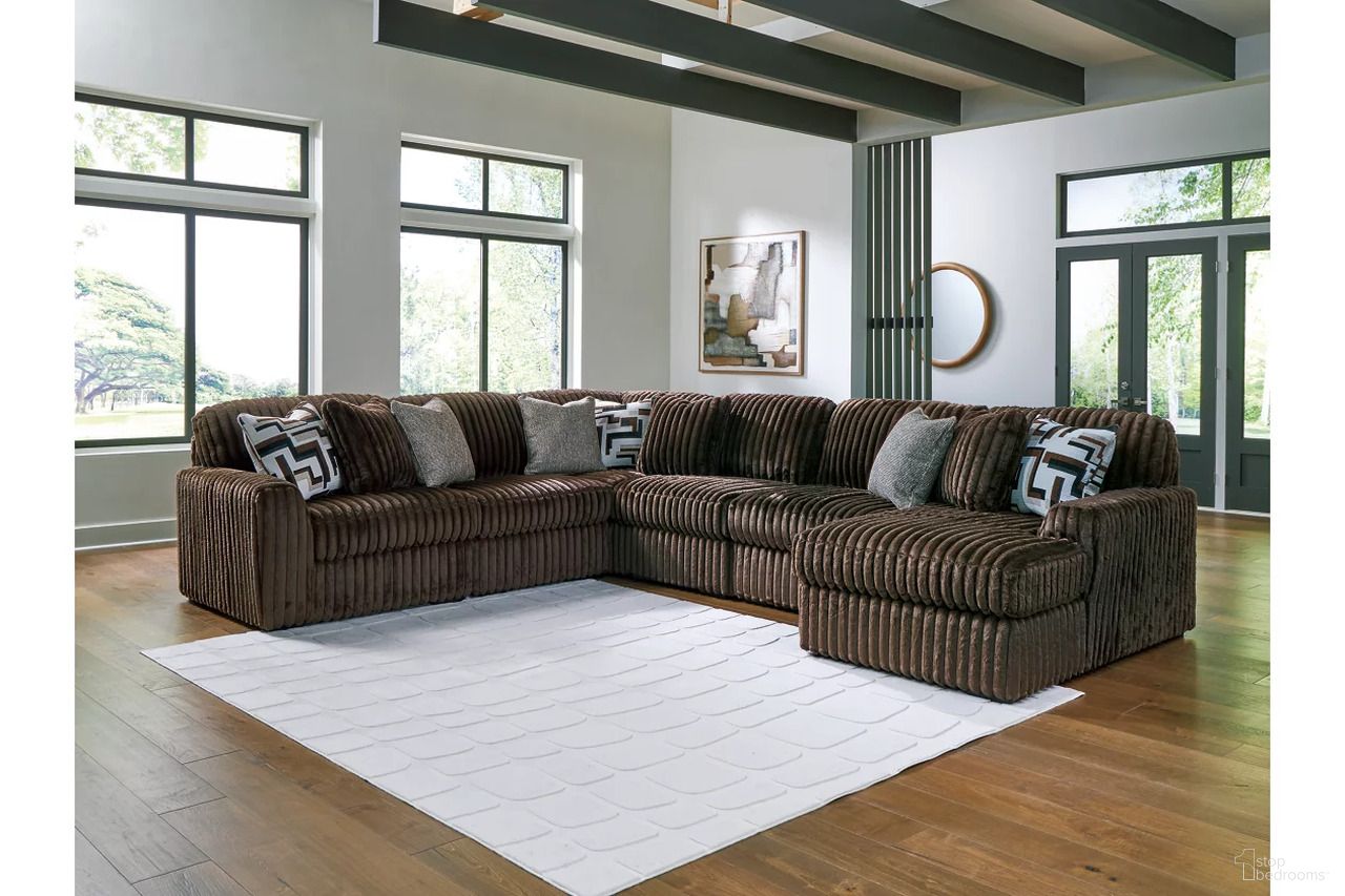The appearance of Midnight-Madness 6-Piece RAF Sectional with Chaise In Chocolate designed by Signature Design by Ashley in the modern / contemporary interior design. This chocolate piece of furniture was selected by 1StopBedrooms from Midnight-Madness Collection to add a touch of cosiness and style into your home. Sku: 9810417;9810446;9810446;9810446;9810464;9810477. Material: Polyester. Orientation: RAF.