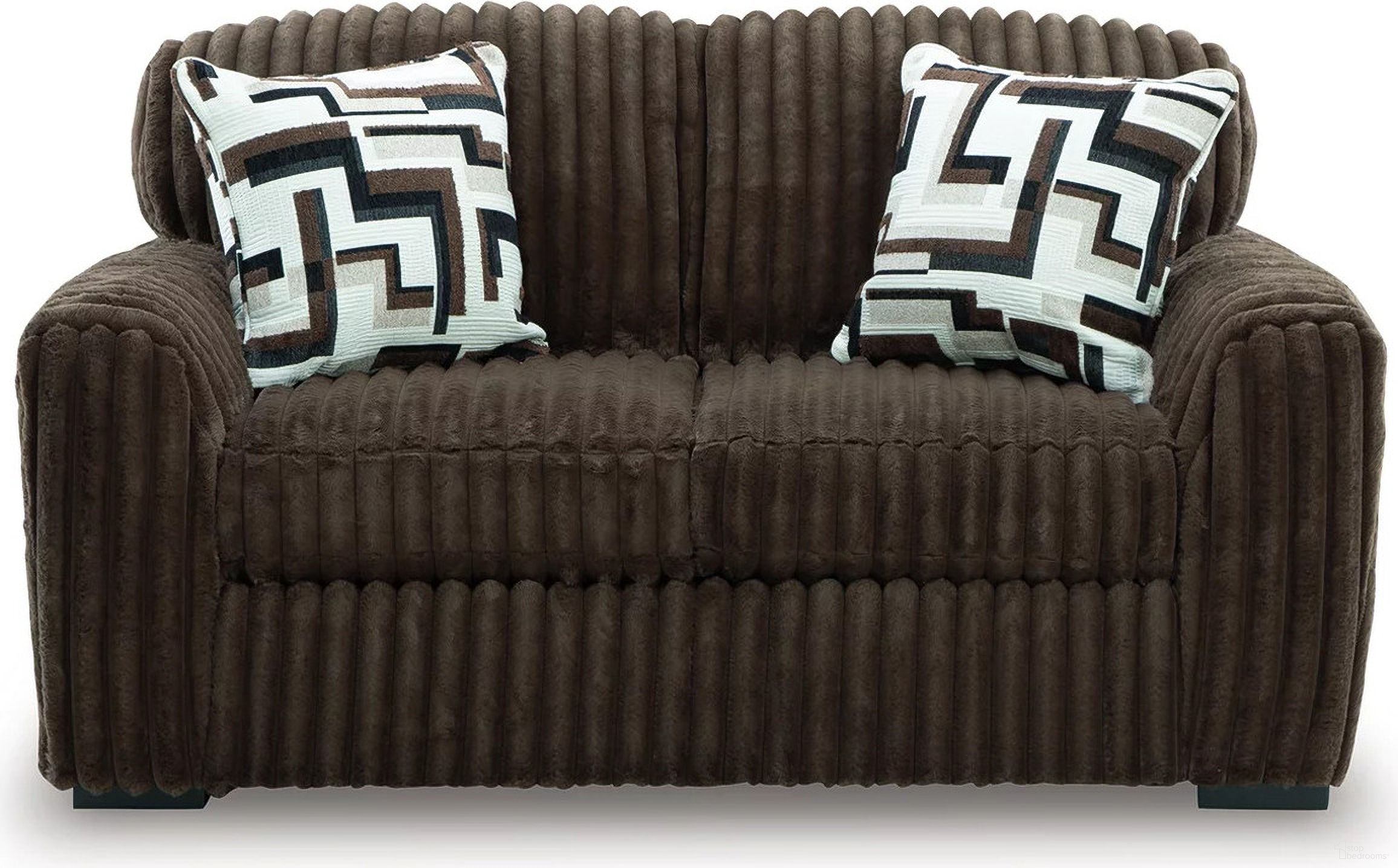 The appearance of Midnight-Madness Loveseat In Chocolate designed by Signature Design by Ashley in the modern / contemporary interior design. This chocolate piece of furniture  was selected by 1StopBedrooms from Midnight-Madness Collection to add a touch of cosiness and style into your home. Sku: 9810435. Material: Corduroy.