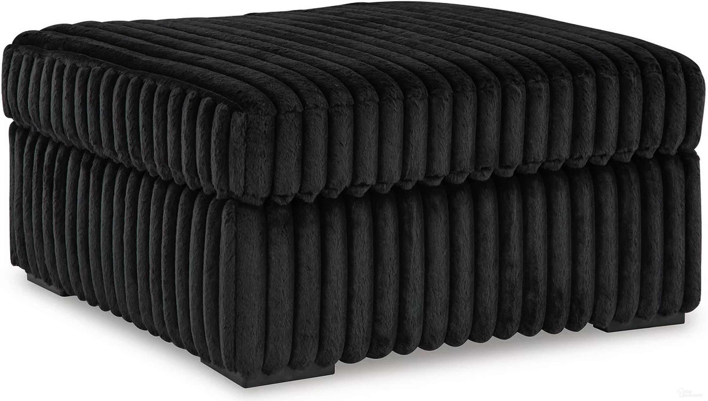 The appearance of Midnight-Madness Oversized Accent Ottoman In Onyx designed by Signature Design by Ashley in the modern / contemporary interior design. This onyx piece of furniture  was selected by 1StopBedrooms from Midnight-Madness Collection to add a touch of cosiness and style into your home. Sku: 9810308. Material: Fabric.