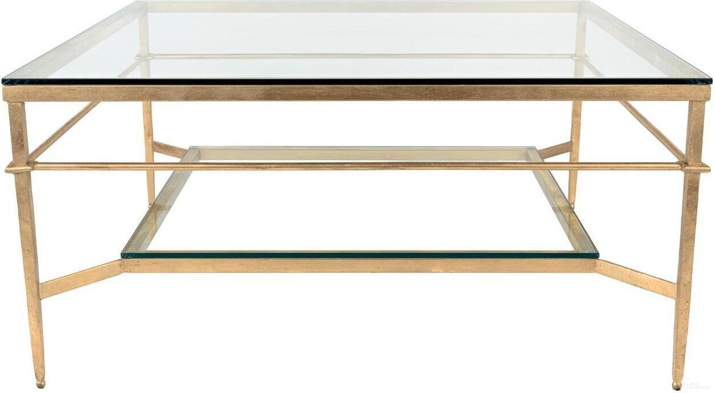 The appearance of Mieka Cocktail Table In Gold and Glass designed by Safavieh Couture in the transitional interior design. This gold/glass piece of furniture  was selected by 1StopBedrooms from Mieka Collection to add a touch of cosiness and style into your home. Sku: AMH8307A. Material: Iron.