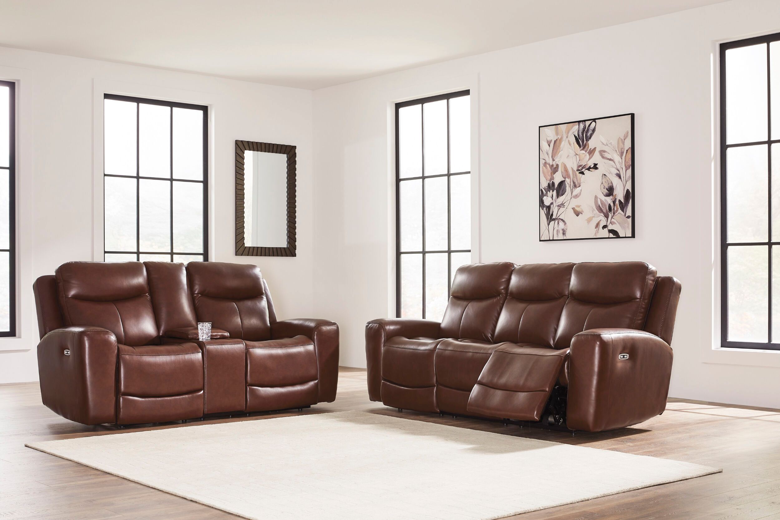 The appearance of Mighty Moves Power Reclining Living Room Set In Mahogany designed by Signature Design by Ashley in the modern / contemporary interior design. This mahogany piece of furniture was selected by 1StopBedrooms from Mighty Moves Collection to add a touch of cosiness and style into your home. Sku: NCU1210215;NCU1210218. Material: Leather Match.