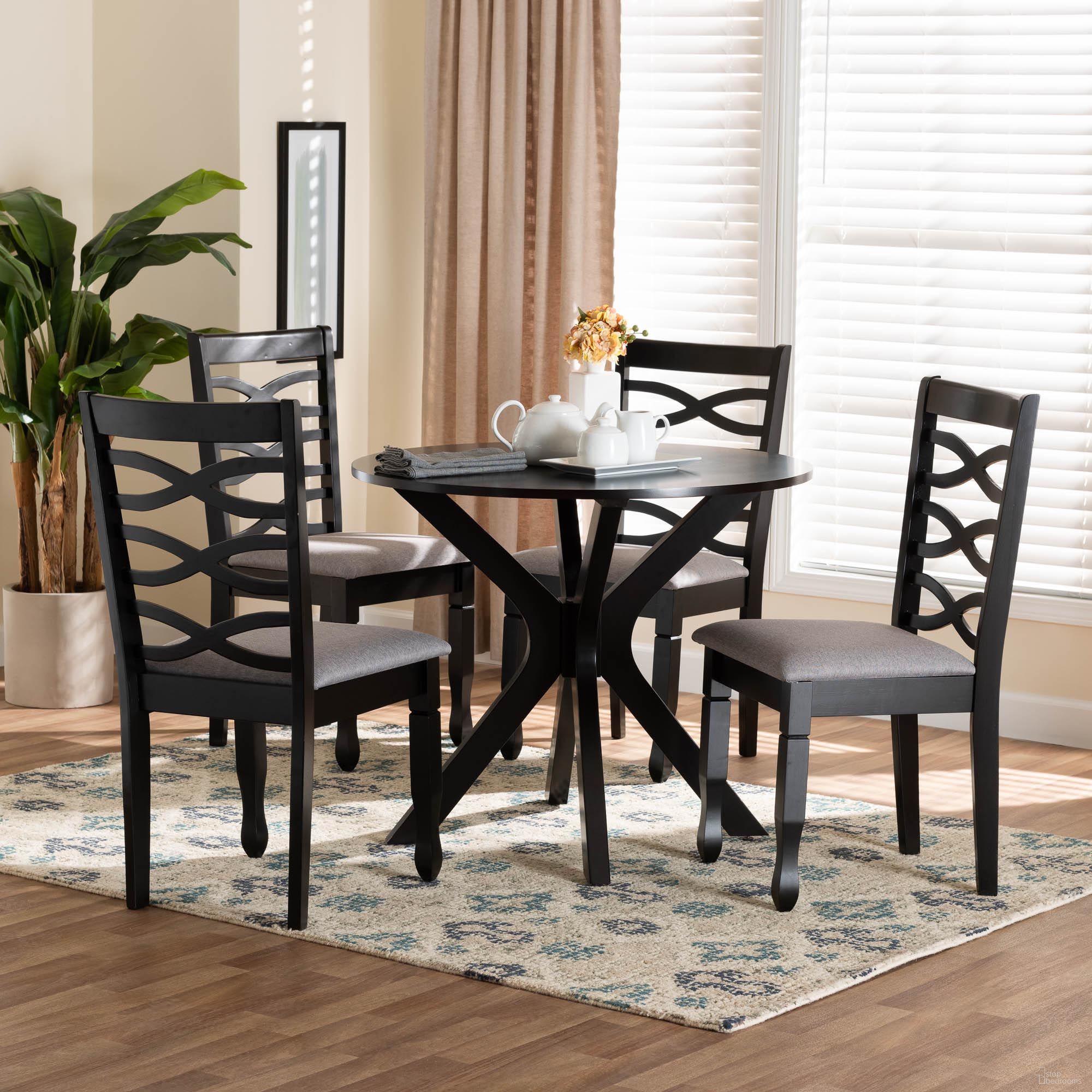 The appearance of Mila Fabric and Wood 5-Piece Dining Set In Grey and Dark Brown designed by Baxton Studio in the modern / contemporary interior design. This grey and dark brown piece of furniture was selected by 1StopBedrooms from Mila Collection to add a touch of cosiness and style into your home. Sku: Mila-Grey/Dark Brown-5PC Dining Set. Table Base Style: Pedestal. Table Top Shape: Round. Material: Rubberwood. Size: 34".