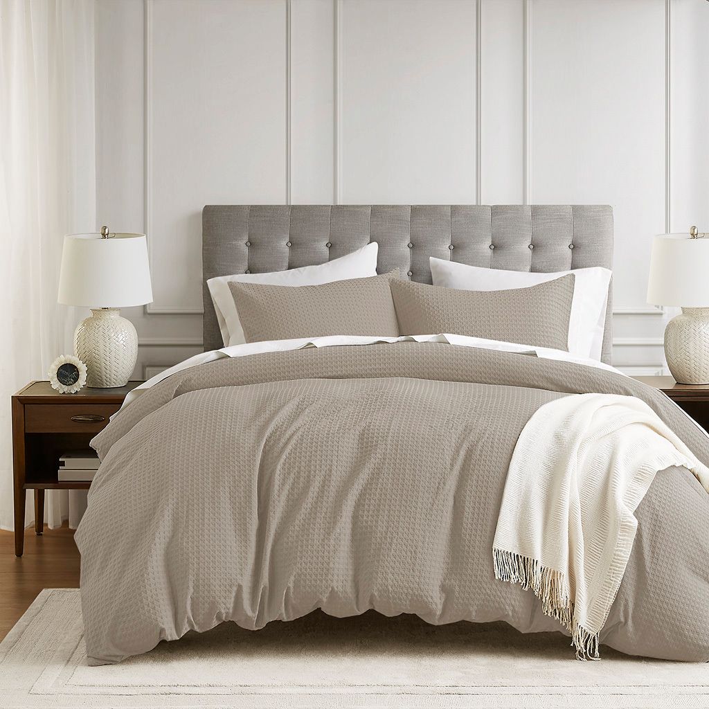The appearance of Mina Waffle Weave Textured Duvet Cover Set In Neutral designed by Olliix in the modern / contemporary interior design. This neutral piece of furniture was selected by 1StopBedrooms from Mina Collection to add a touch of cosiness and style into your home. Sku: AM12-0049. Material: Polyester. Bed Size: Twin.