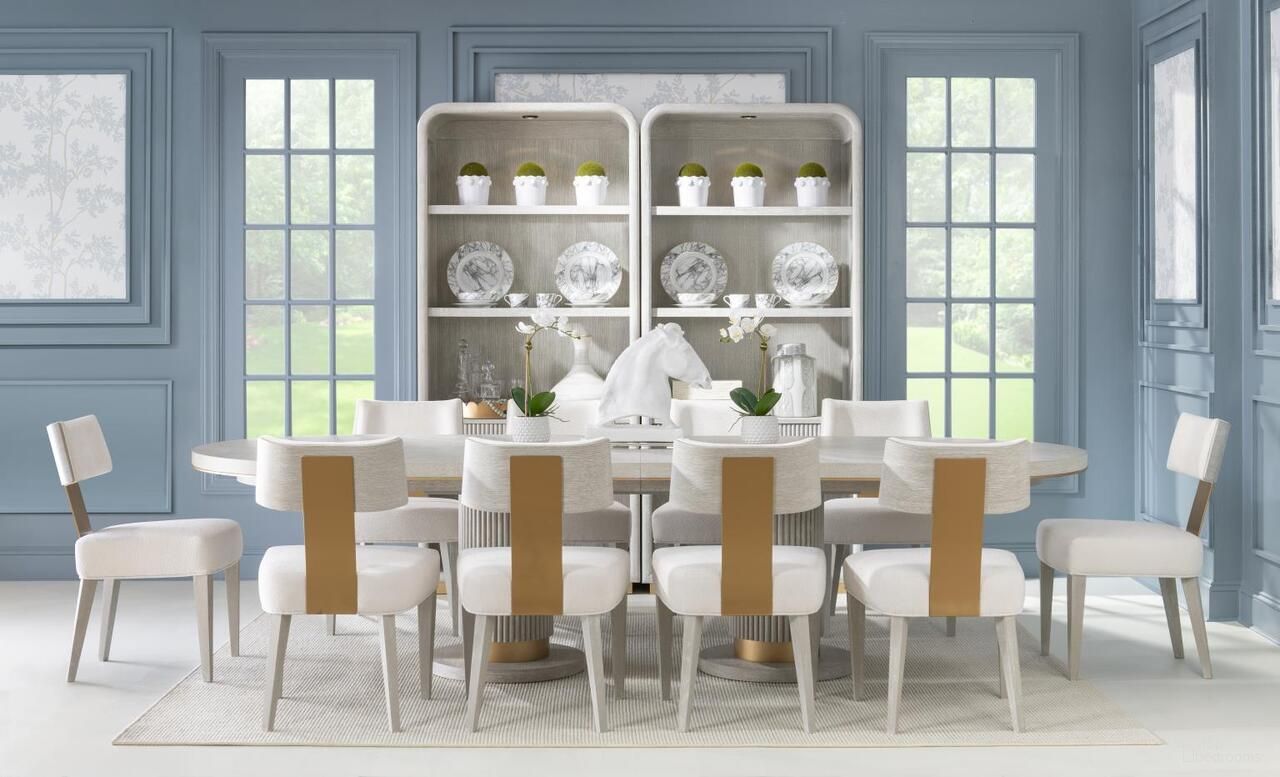 The appearance of Miramar Oval Dining Room Set In Oyster designed by Legacy Classic in the modern / contemporary interior design. This oyster piece of furniture  was selected by 1StopBedrooms from Miramar Collection to add a touch of cosiness and style into your home. Sku: 3300-421T;3300-421B;3300-140. Table Top Shape: Oval. Size: 122" x 46". Material: Oak Veneer.