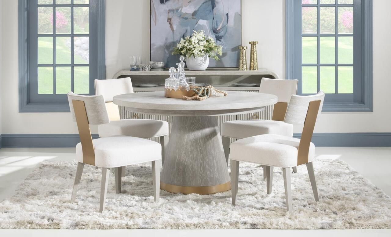 The appearance of Miramar Round Dining Room Set In Oyster designed by Legacy Classic in the modern / contemporary interior design. This oyster piece of furniture  was selected by 1StopBedrooms from Miramar Collection to add a touch of cosiness and style into your home. Sku: 3300-521T;3300-421B;3300-140. Table Top Shape: Oval. Size: 72" x 54". Material: Oak Veneer.