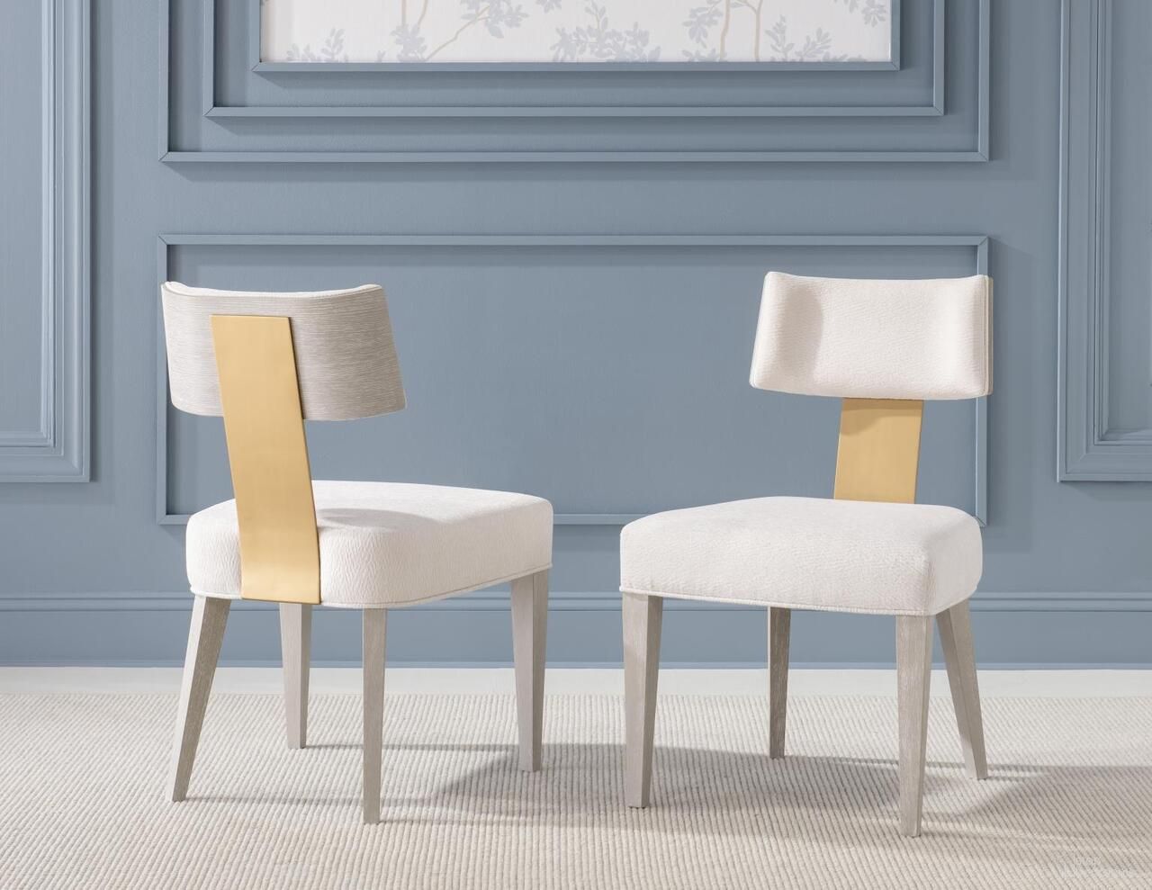 The appearance of Miramar Upholstered Side Chair Set of 2 In Oyster designed by Legacy Classic in the modern / contemporary interior design. This oyster piece of furniture  was selected by 1StopBedrooms from Miramar Collection to add a touch of cosiness and style into your home. Sku: 3300-140. Material: Oak Veneer. Chair Type: Side Chair.