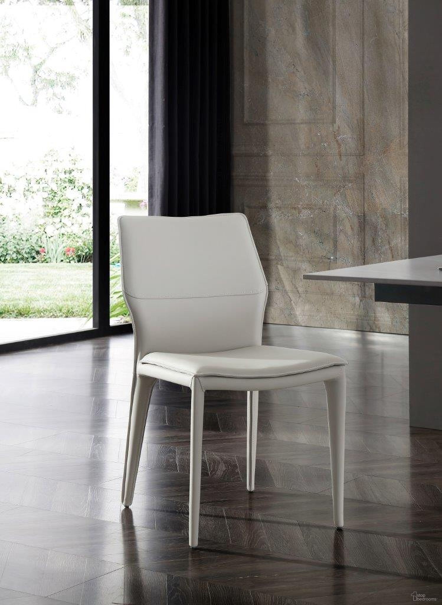 The appearance of Miranda Light Grey Dining Chair Set of 2 designed by Whiteline Modern Living in the modern / contemporary interior design. This light grey piece of furniture was selected by 1StopBedrooms from Miranda Collection to add a touch of cosiness and style into your home. Sku: DC1475-LGRY. Material: Faux Leather. Chair Type: Side Chair.