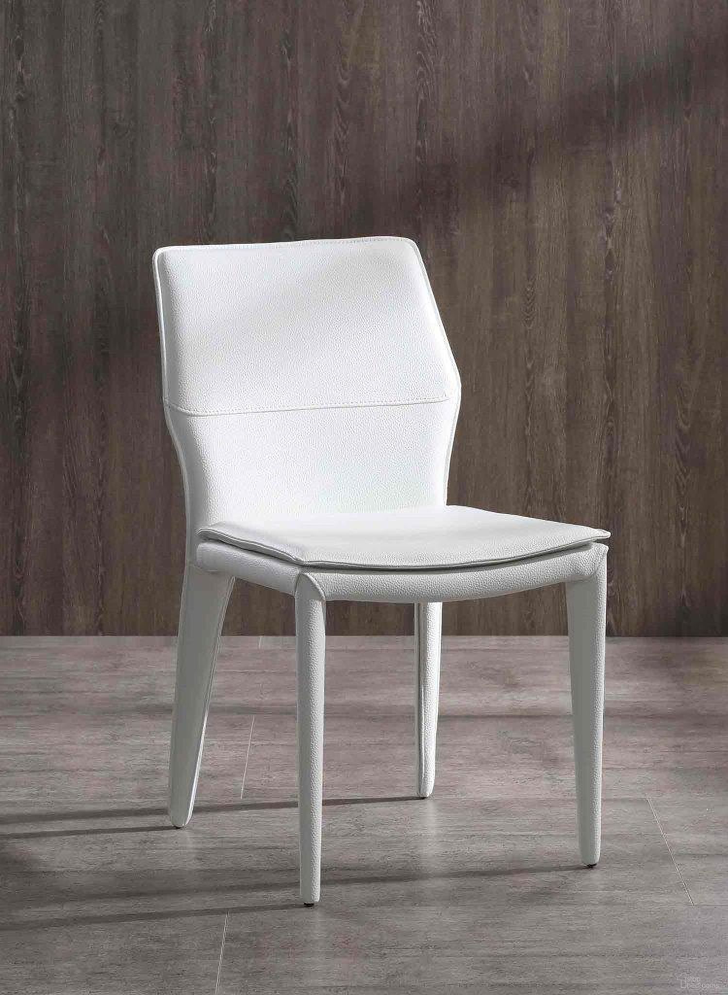 The appearance of Miranda White Dining Chair Set of 2 designed by Whiteline Modern Living in the modern / contemporary interior design. This white piece of furniture was selected by 1StopBedrooms from Miranda Collection to add a touch of cosiness and style into your home. Sku: DC1475-WHT. Material: Faux Leather. Chair Type: Side Chair.