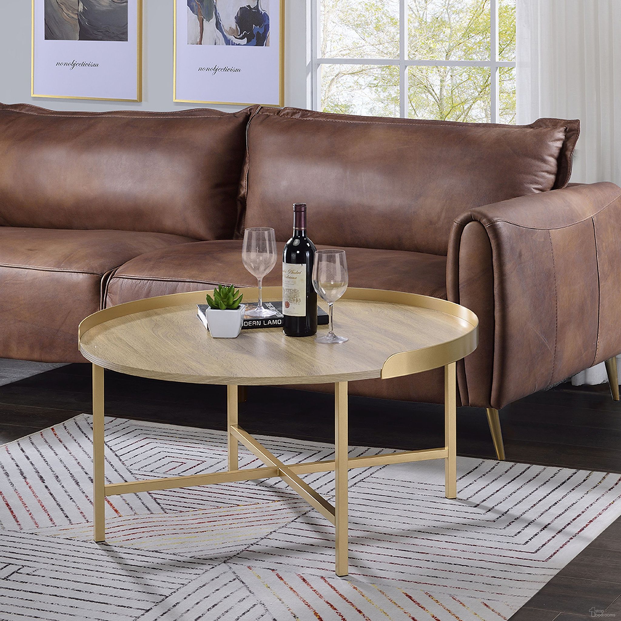 The appearance of Mithea Coffee Table In Oak Table Top And Gold designed by ACME in the modern / contemporary interior design. This gold piece of furniture was selected by 1StopBedrooms from Mithea Collection to add a touch of cosiness and style into your home. Sku: 82335. Material: Wood.