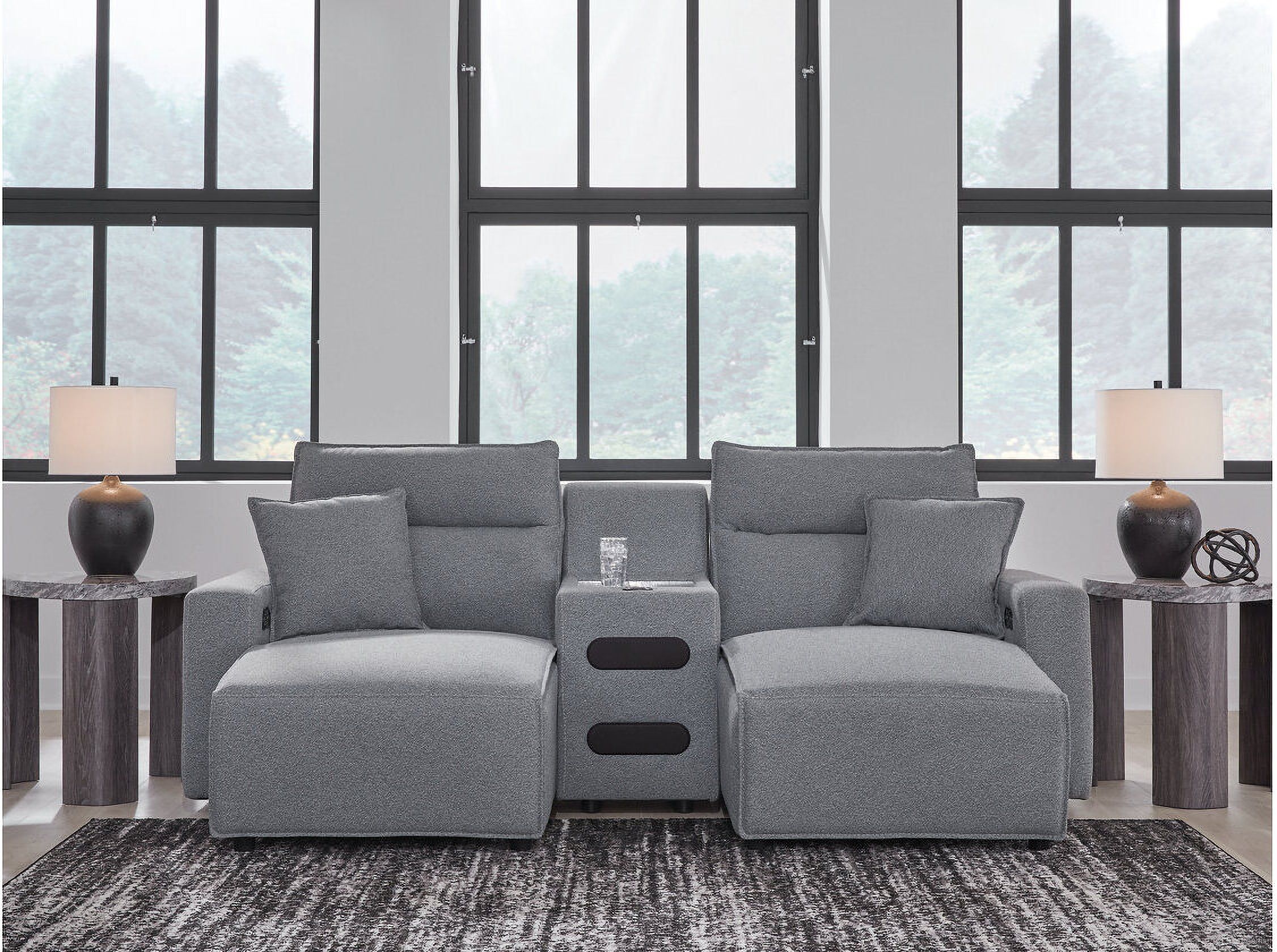 The appearance of Modmax 3-Piece Power Reclining Sectional with Chaise In Salt and Pepper designed by Signature Design by Ashley in the modern / contemporary interior design. This salt & pepper piece of furniture was selected by 1StopBedrooms from Modmax Collection to add a touch of cosiness and style into your home. Sku: 6590679;6590660;6590697. Material: Polyester. Layout: U-Shape.