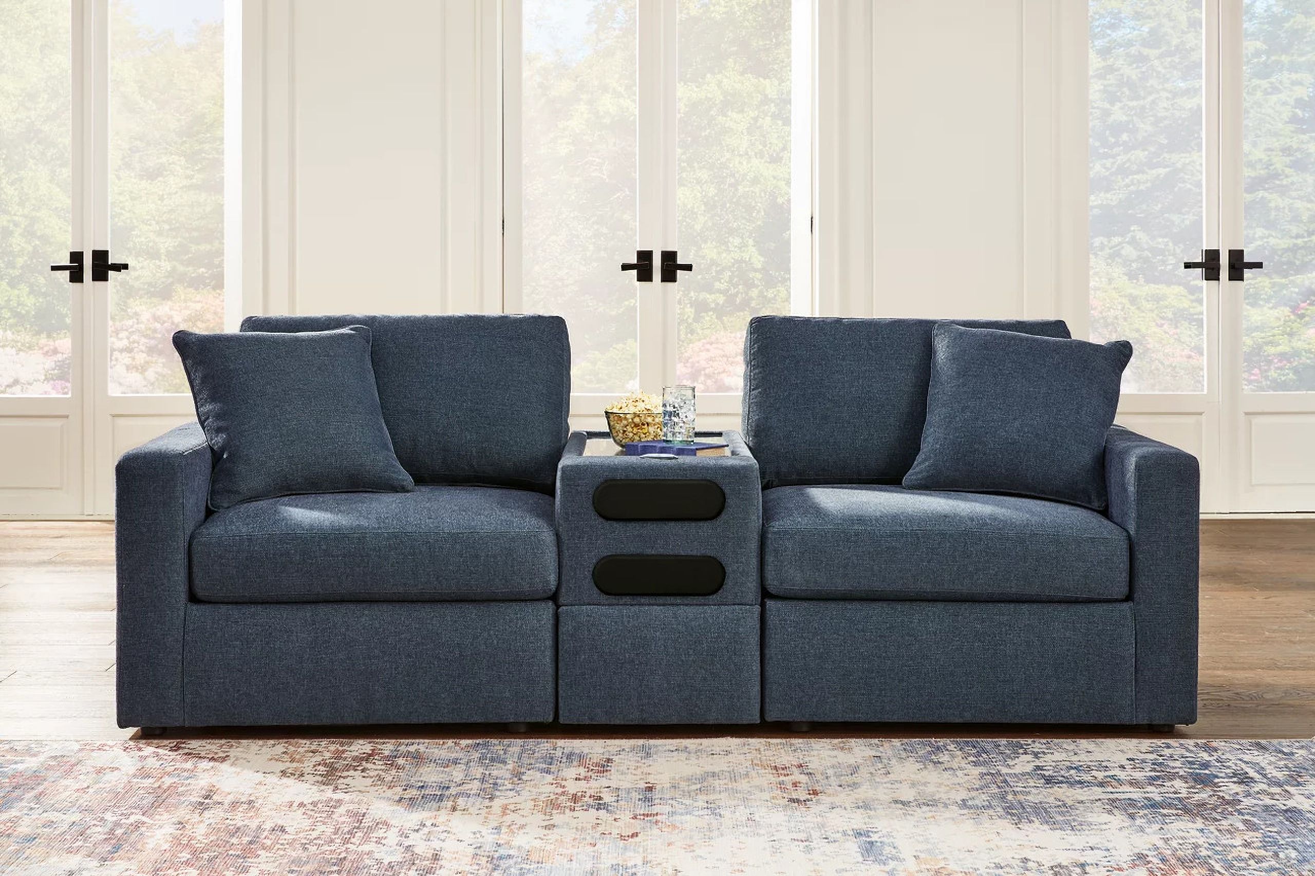 The appearance of Modmax 3-Piece Sectional Loveseat With Audio System In Ink designed by Signature Design by Ashley in the modern / contemporary interior design. This ink piece of furniture  was selected by 1StopBedrooms from Modmax Collection to add a touch of cosiness and style into your home. Sku: 9212127;9212164;9212165. Material: Polyester.