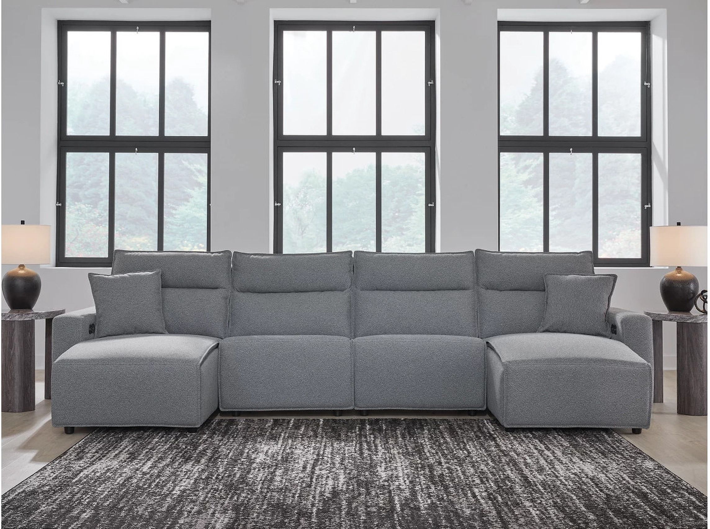 The appearance of Modmax 4-Piece Power Reclining Sectional with Chaise In Salt and Pepper designed by Signature Design by Ashley in the modern / contemporary interior design. This salt & pepper piece of furniture  was selected by 1StopBedrooms from Modmax Collection to add a touch of cosiness and style into your home. Sku: 6590679;6590646;6590646;6590697. Material: Polyester. Layout: U-Shape.