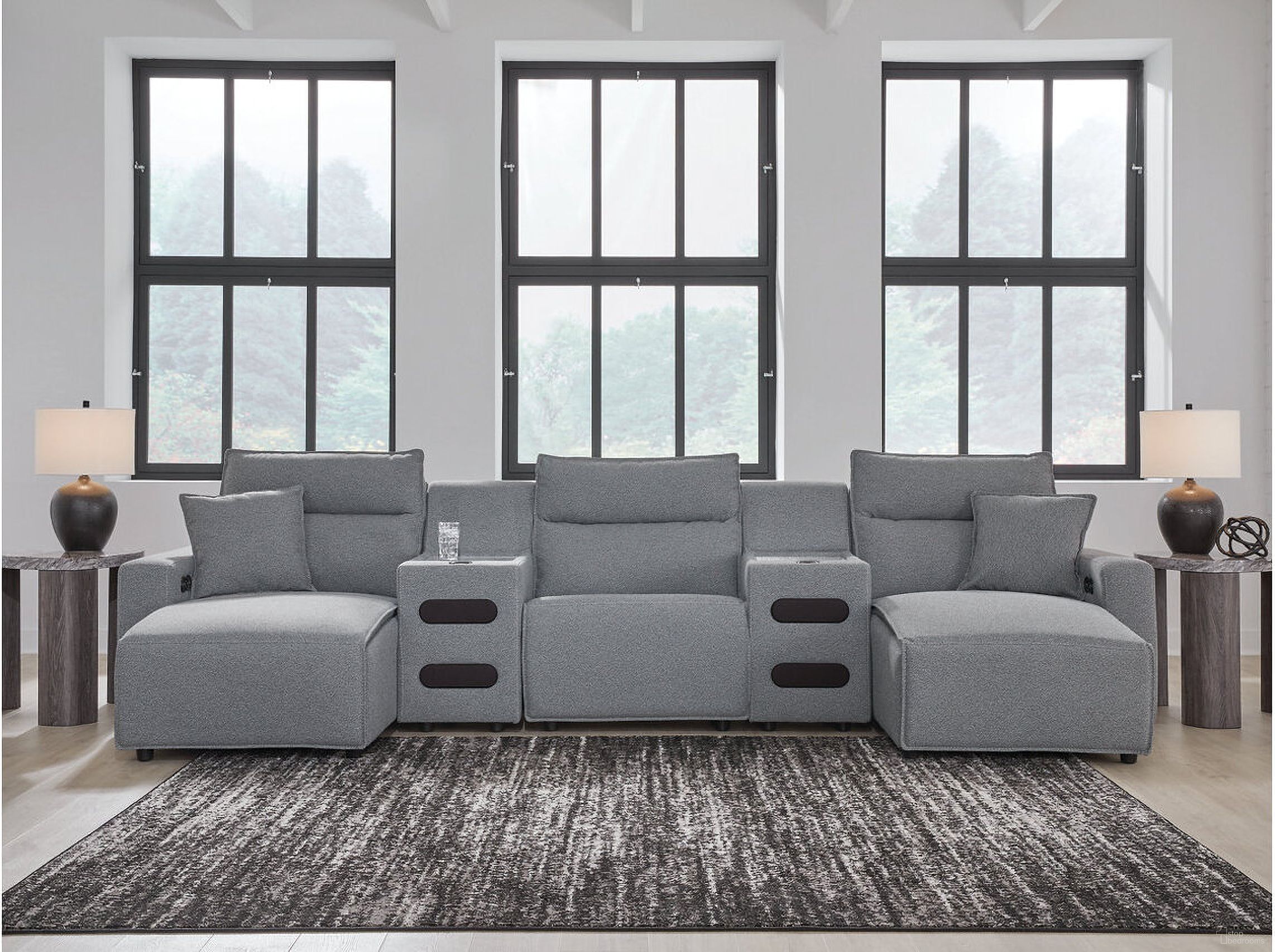 The appearance of Modmax 5-Piece Power Reclining Sectional with Chaise and Audio Console In Salt & Pepper designed by Signature Design by Ashley in the modern / contemporary interior design. This salt & pepper piece of furniture was selected by 1StopBedrooms from Modmax Collection to add a touch of cosiness and style into your home. Sku: 6590679;6590646;6590660;6590660;6590697. Material: Polyester. Layout: U-Shape.