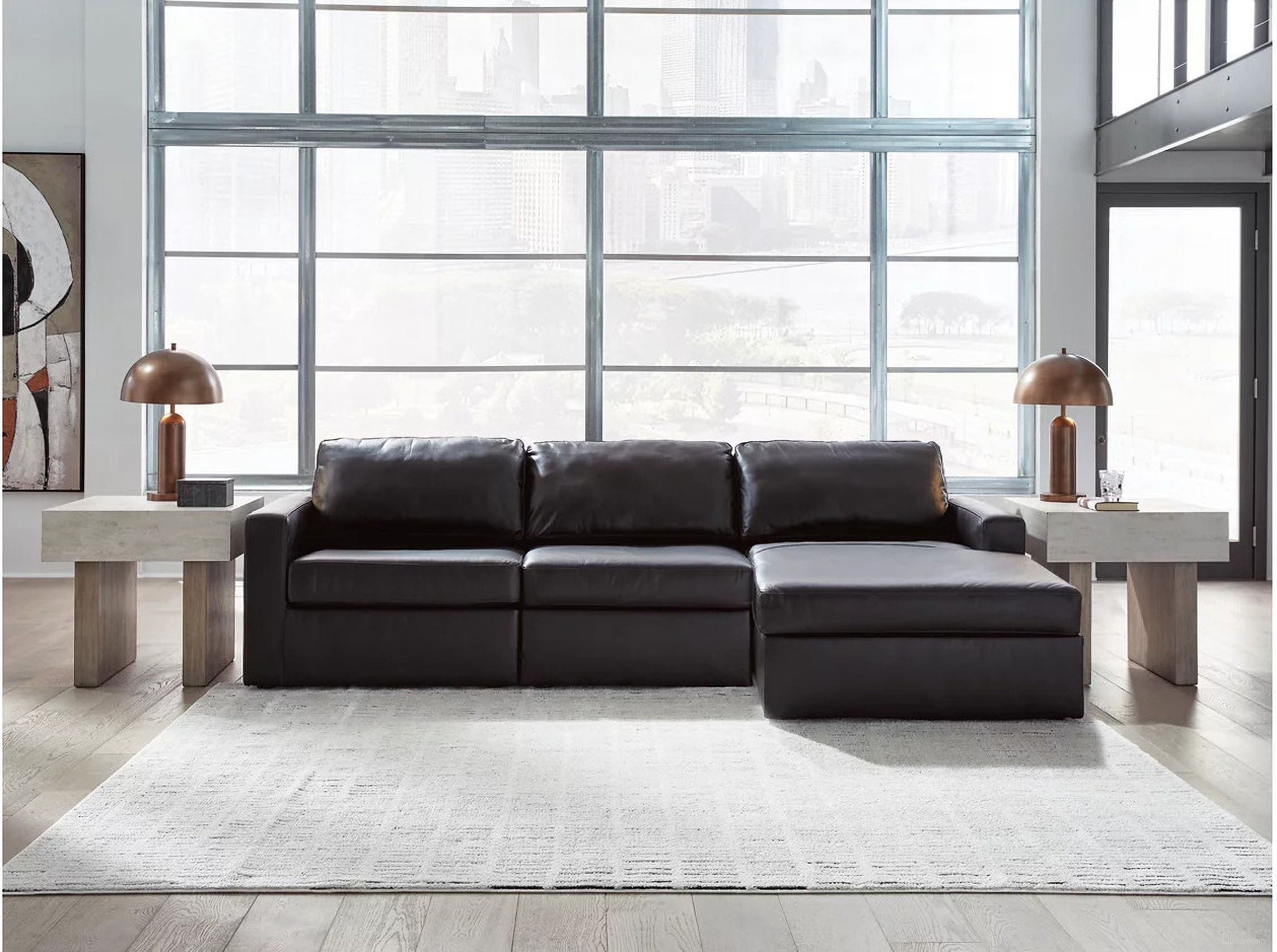 The appearance of ModMax II 3-Piece RAF Sectional Sofa Chaise In Black designed by Signature Design by Ashley in the modern / contemporary interior design. This black piece of furniture was selected by 1StopBedrooms from ModMax II Collection to add a touch of cosiness and style into your home. Sku: 7430517;7430546;7430564. Material: Leather. Orientation: RAF.