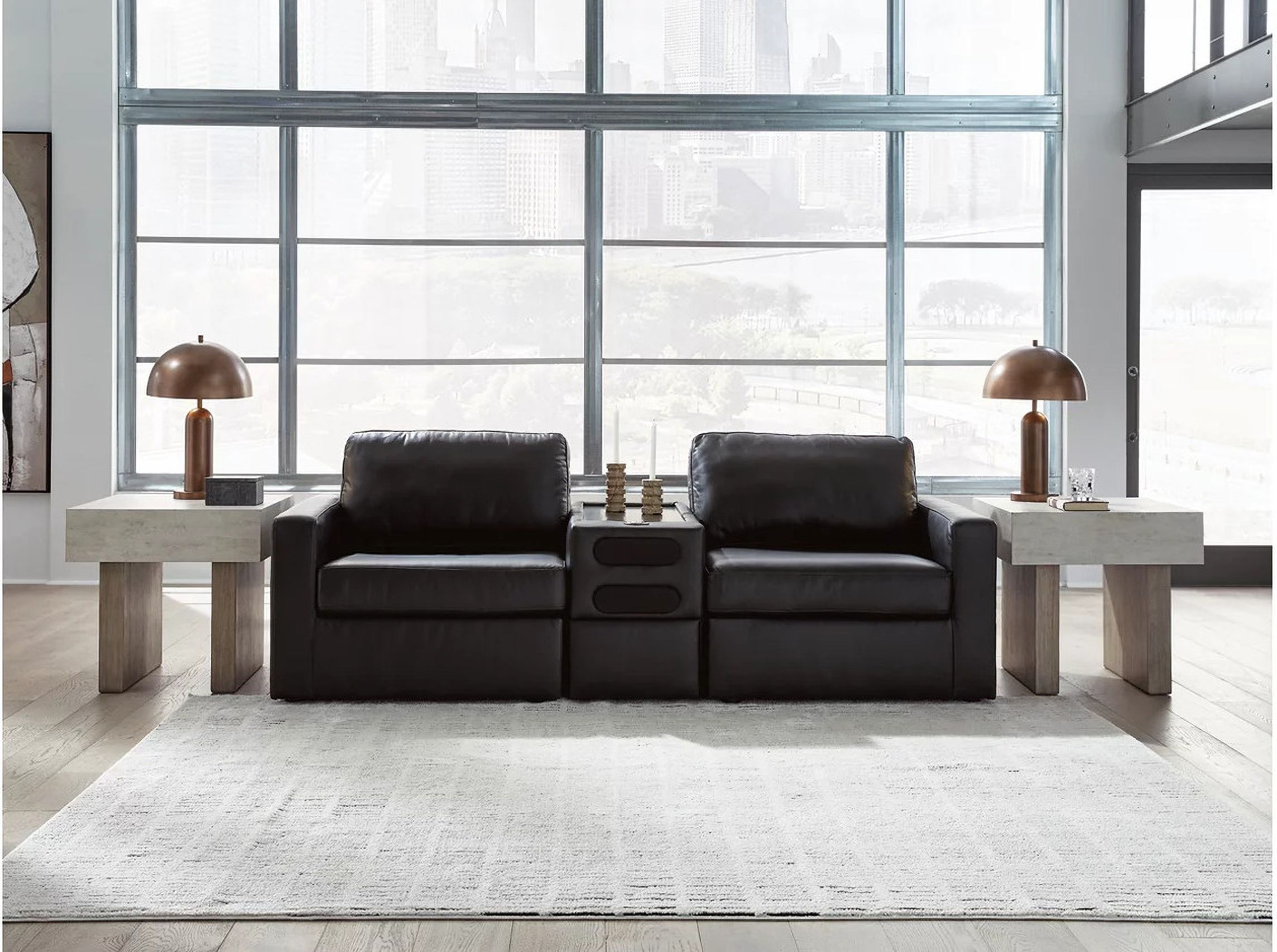 The appearance of ModMax II 3-Piece Sectional Loveseat with Audio Console In Black designed by Signature Design by Ashley in the modern / contemporary interior design. This black piece of furniture  was selected by 1StopBedrooms from ModMax II Collection to add a touch of cosiness and style into your home. Sku: 7430527;7430564;7430565. Material: Leather.