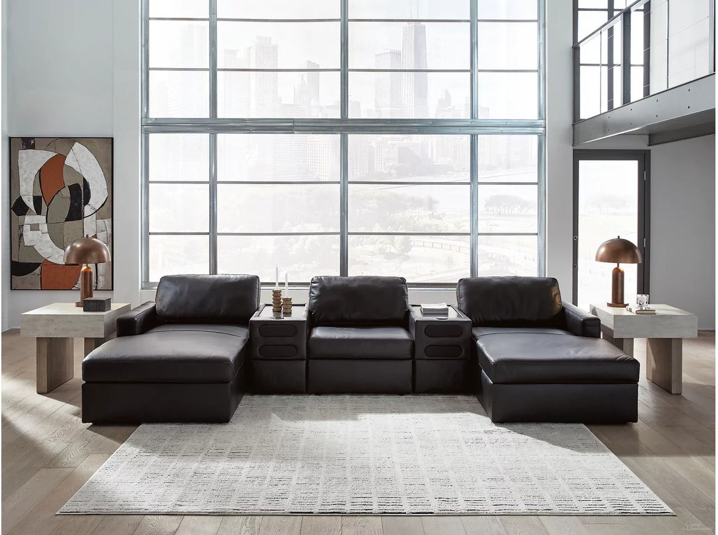 The appearance of ModMax II 5-Piece Double Chaise Sectional with Audio Consoles In Black designed by Signature Design by Ashley in the modern / contemporary interior design. This black piece of furniture  was selected by 1StopBedrooms from ModMax II Collection to add a touch of cosiness and style into your home. Sku: 7430516;7430517;7430527;7430527;7430546. Material: Leather.