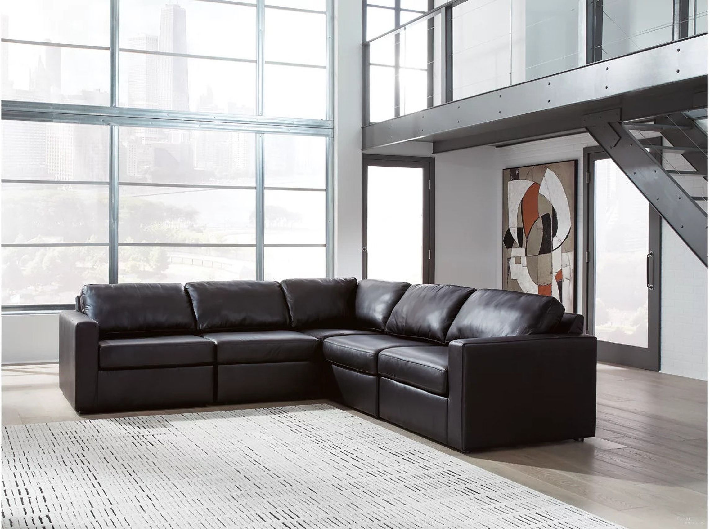 The appearance of ModMax II 5-Piece Sectional In Black designed by Signature Design by Ashley in the modern / contemporary interior design. This black piece of furniture was selected by 1StopBedrooms from ModMax II Collection to add a touch of cosiness and style into your home. Sku: 7430546;7430546;7430564;7430565;7430577. Material: Leather. Layout: L-Shape.