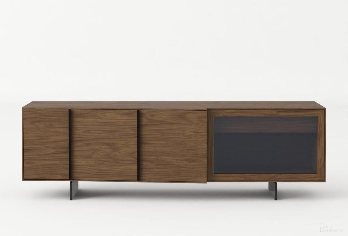 The appearance of Modrest Glencoe Modern Walnut And Grey Glass Buffet designed by VIG Furniture in the modern / contemporary interior design. This walnut piece of furniture was selected by 1StopBedrooms from Modrest Collection to add a touch of cosiness and style into your home. Sku: VGBBMK2005SB-BUFF. Material: Glass.