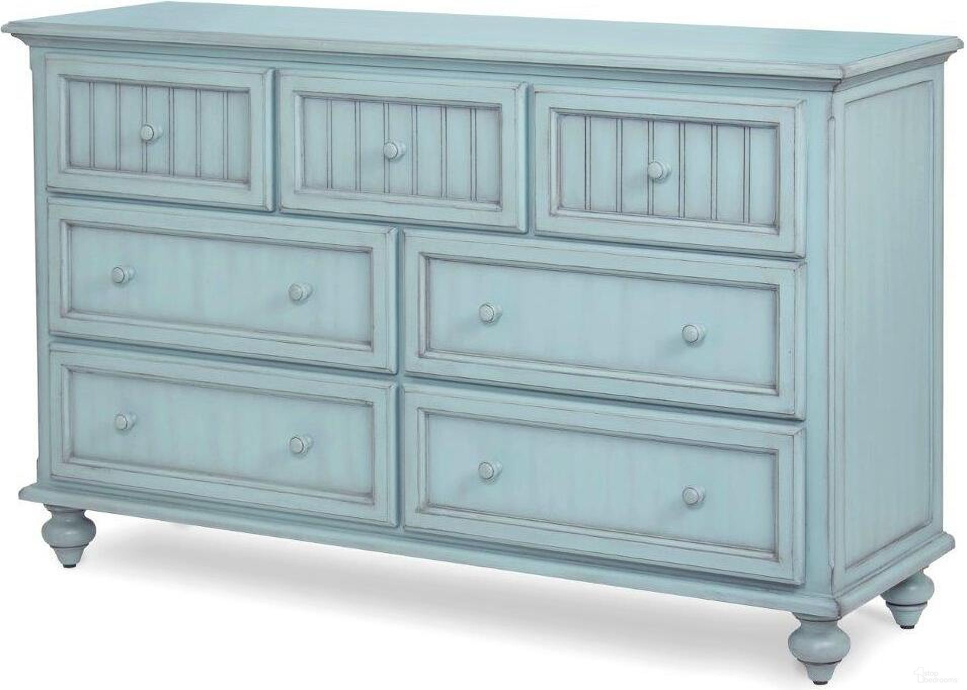 The appearance of Monaco 7 Drawer Dresser In Blue designed by Sea Winds Trading in the transitional interior design. This blue piece of furniture was selected by 1StopBedrooms from Monaco Collection to add a touch of cosiness and style into your home. Sku: B81837-BLEU. Material: Wood.