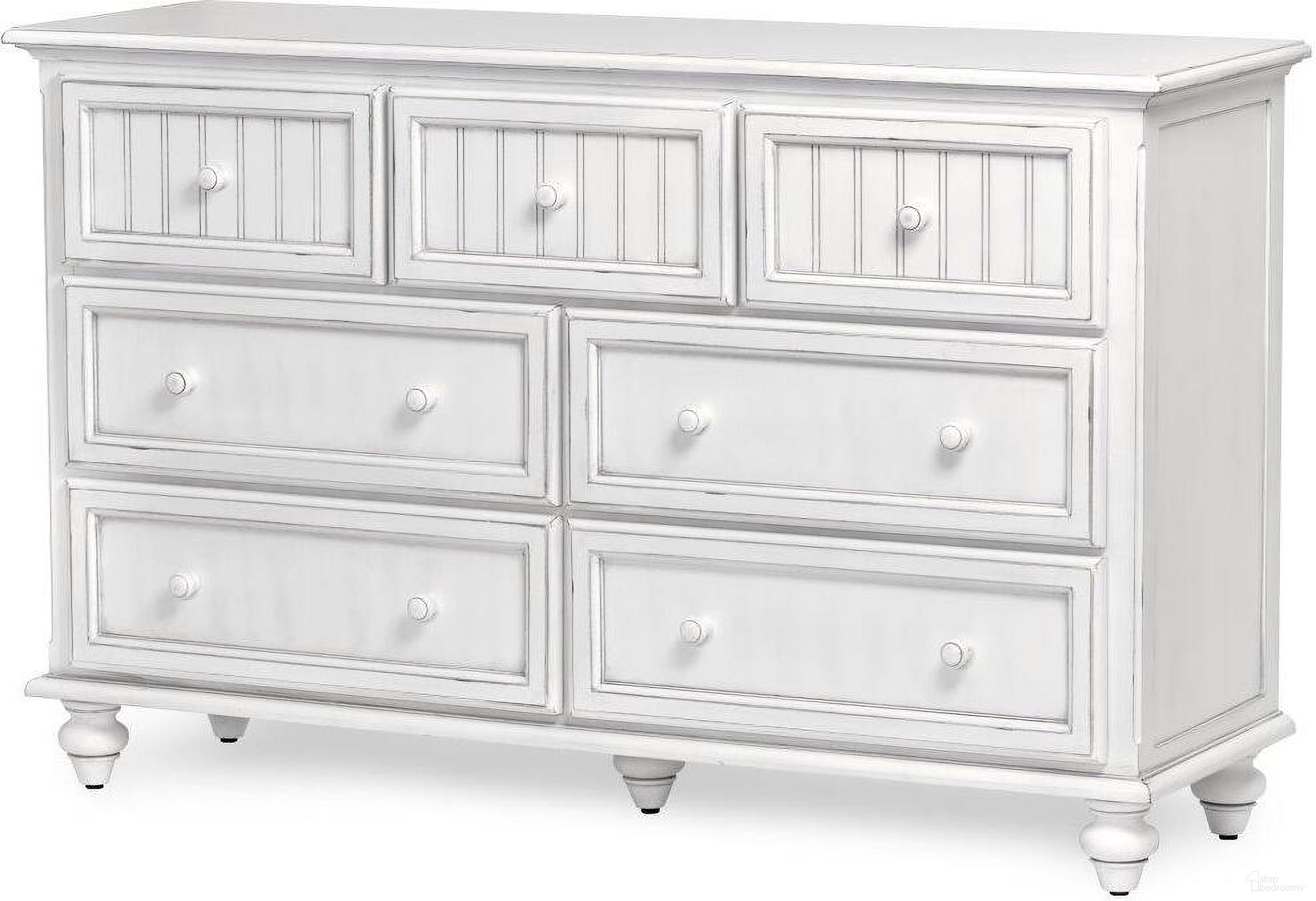 The appearance of Monaco 7 Drawer Dresser In White designed by Sea Winds Trading in the transitional interior design. This white piece of furniture was selected by 1StopBedrooms from Monaco Collection to add a touch of cosiness and style into your home. Sku: B81837-BLANC. Material: Wood.