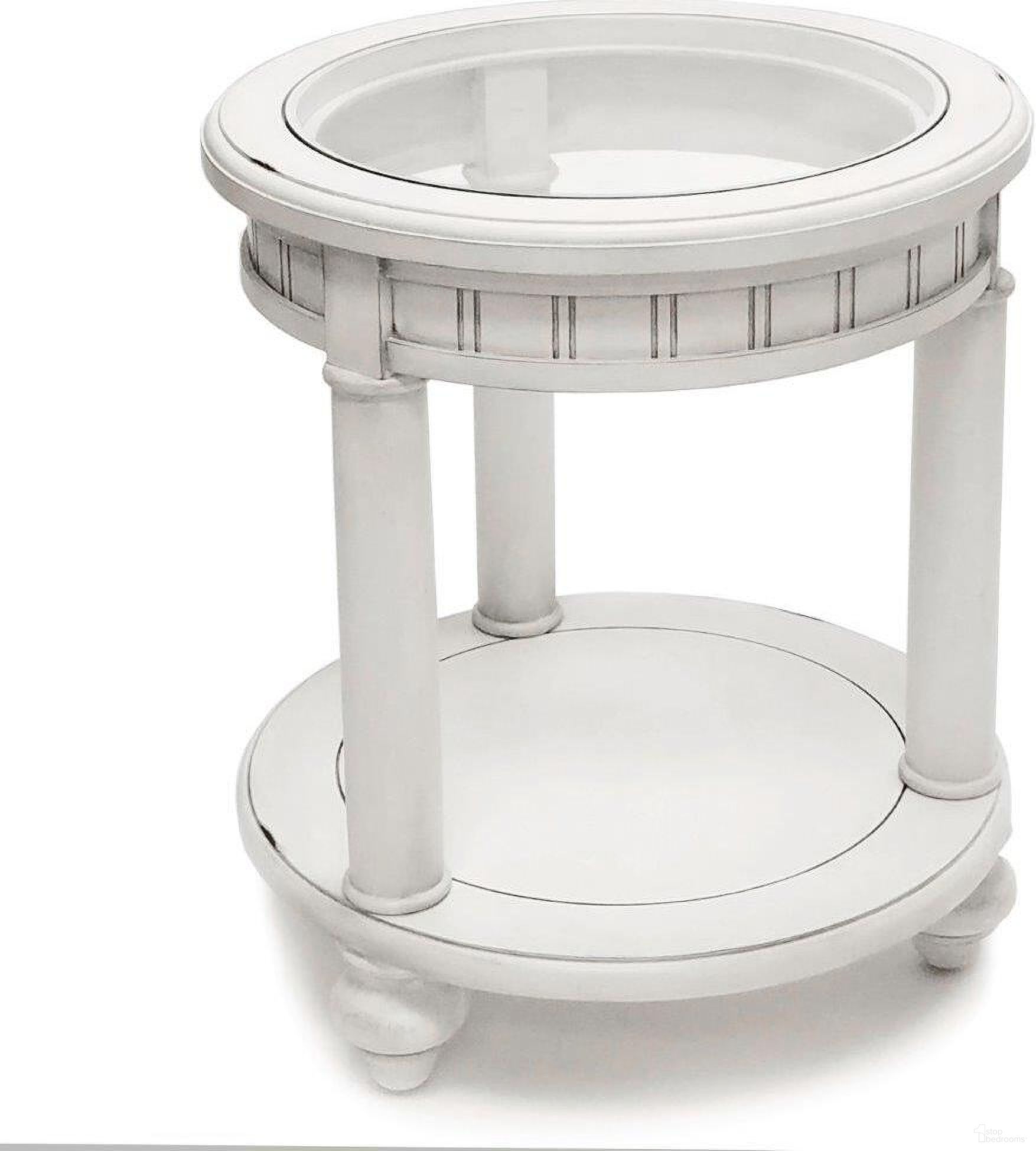 The appearance of Monaco Round End Table In White designed by Sea Winds Trading in the transitional interior design. This white piece of furniture  was selected by 1StopBedrooms from Monaco Collection to add a touch of cosiness and style into your home. Sku: B81802-BLANC. Material: Wood.