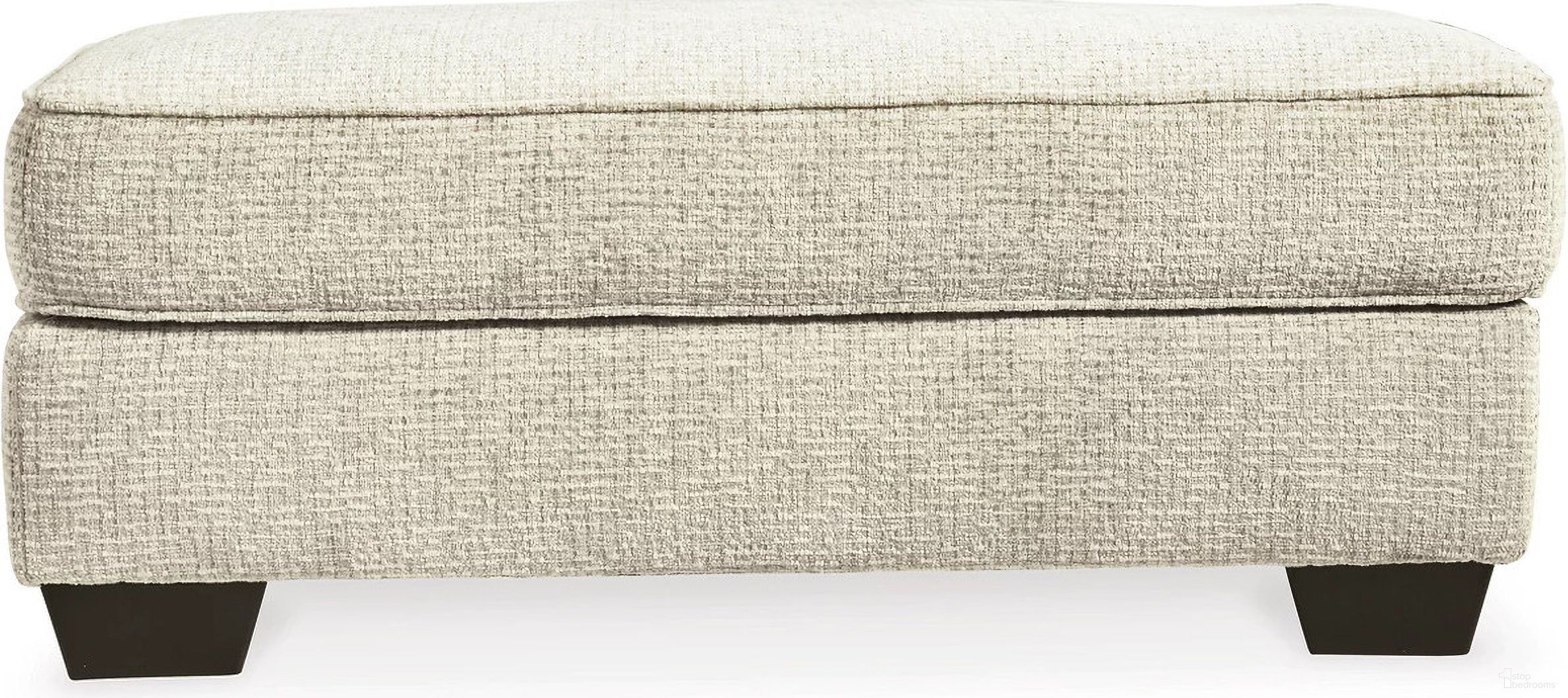 The appearance of Monaghan Ottoman In Sandstone designed by Signature Design by Ashley in the transitional interior design. This sandstone piece of furniture  was selected by 1StopBedrooms from Monaghan Collection to add a touch of cosiness and style into your home. Sku: 9620514. Material: Fabric.