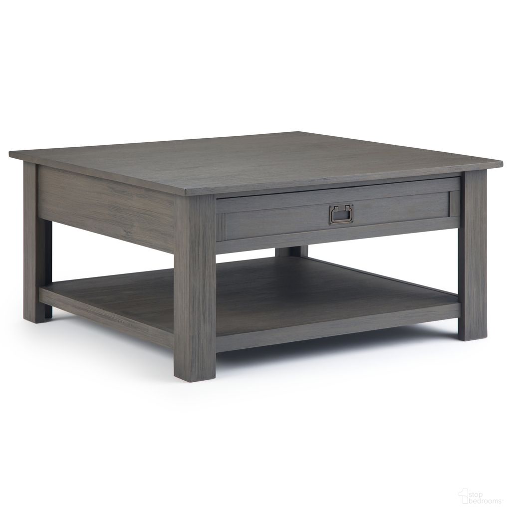 The appearance of Monroe Solid Acacia Wood Square Coffee Table In Farmhouse Grey designed by Simpli Home in the rustic / southwestern interior design. This farmhouse grey piece of furniture  was selected by 1StopBedrooms from Monroe Collection to add a touch of cosiness and style into your home. Sku: AXCMON-02-FG. Material: Acacia.