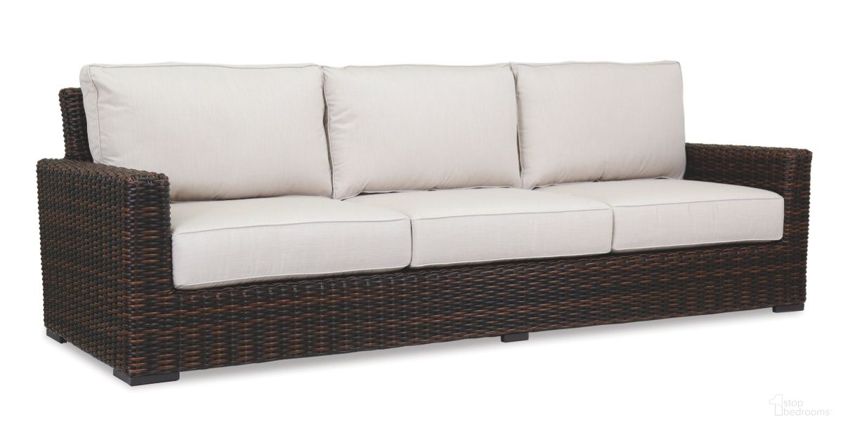 The appearance of Montecito Sofa in Canvas Flax designed by Sunset West in the transitional interior design. This canvas flax piece of furniture was selected by 1StopBedrooms from Montecito Collection to add a touch of cosiness and style into your home. Sku: SW2501-23-FLAX-STKIT. Material: Resin Wicker.