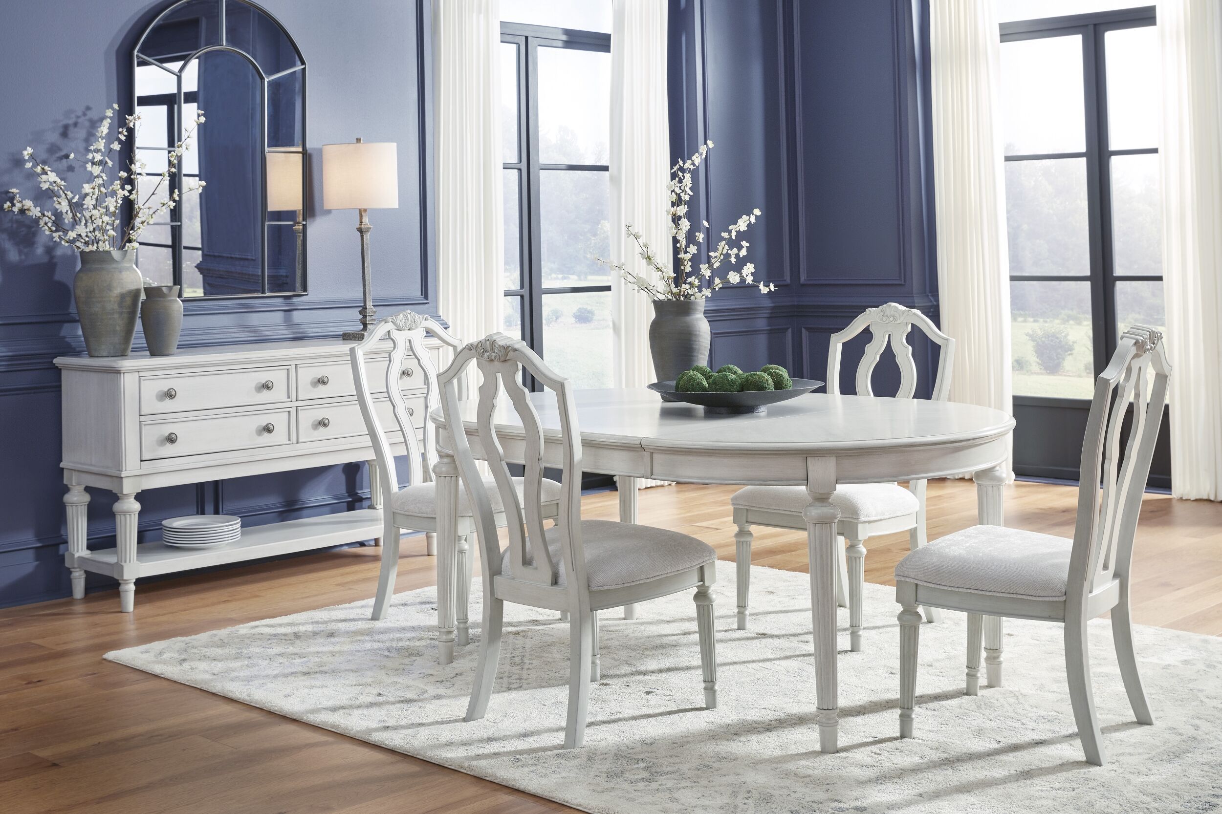 The appearance of Montelaine Extension Dining Room Set In Antique White designed by Signature Design by Ashley in the traditional interior design. This antique white piece of furniture was selected by 1StopBedrooms from Montelaine Collection to add a touch of cosiness and style into your home. Sku: D795-35;D795-01. Table Base Style: Legs. Table Top Shape: Oval. Material: Wood. Size: 72" x 48".