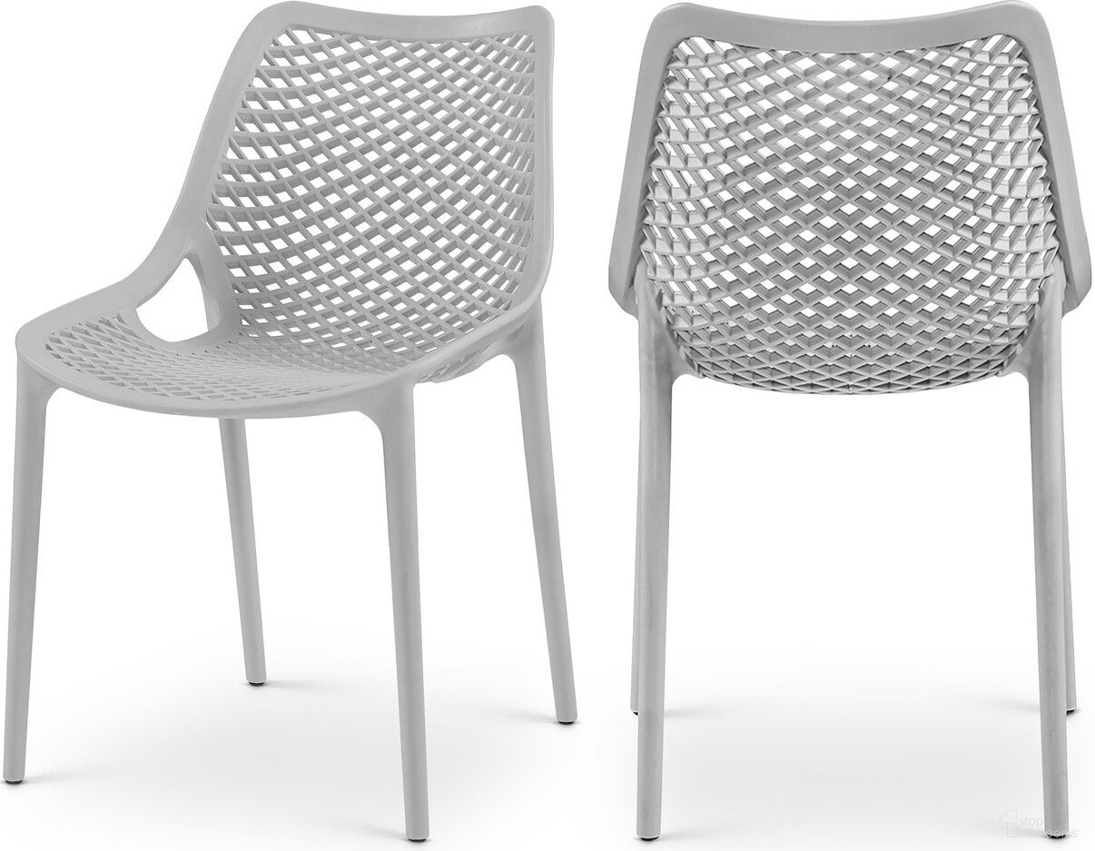 The appearance of Mykonos Outdoor Patio Dining Side Chair Set of 4 In Grey designed by Meridian in the modern / contemporary interior design. This grey piece of furniture  was selected by 1StopBedrooms from Mykonos Collection to add a touch of cosiness and style into your home. Sku: 328Grey. Material: Polypropylene.