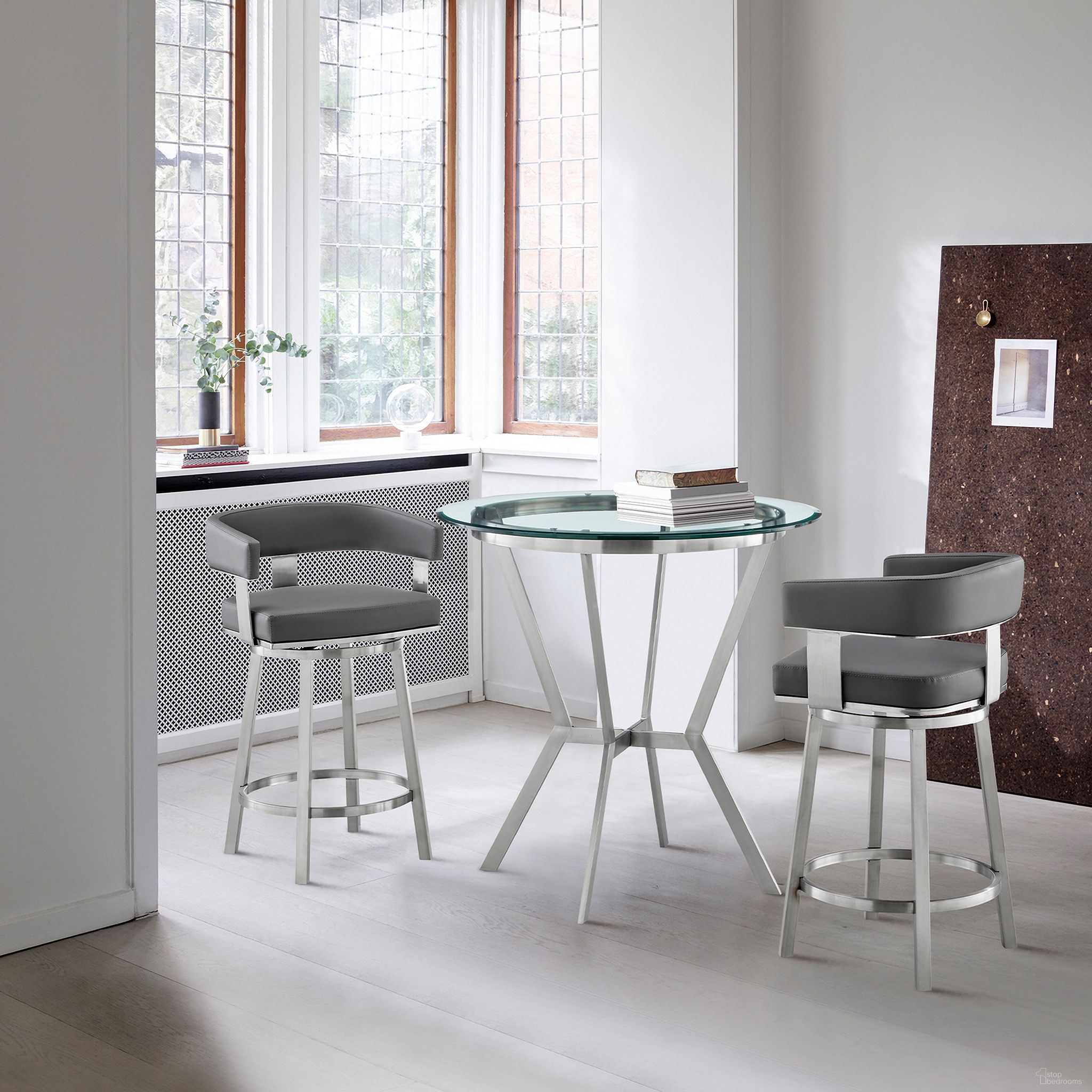 The appearance of Naomi and Lorin 3-Piece Counter Height Dining Set In Brushed Stainless Steel and Gray Faux Leather designed by Armen Living in the modern / contemporary interior design. This stainless steel piece of furniture was selected by 1StopBedrooms from Naomi and Lorin Collection to add a touch of cosiness and style into your home. Sku: LCLRBABSGR26;LCLRBABSGR26;LCNMDIBSBASE;LCNMDIGLTOP. Material: Stainless Steel.
